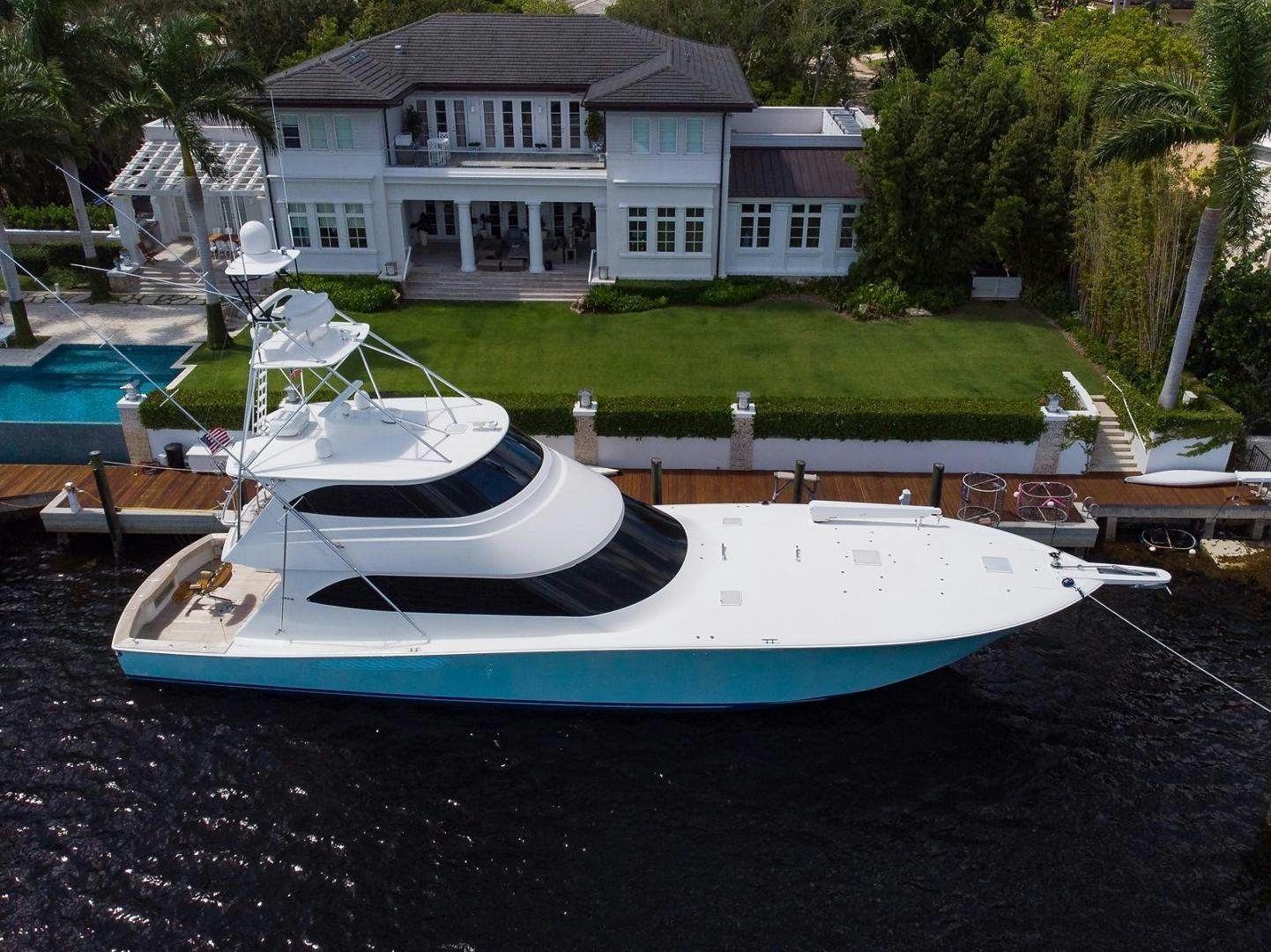a boat tied to a dock aboard NO NAME 82 Yacht for Sale
