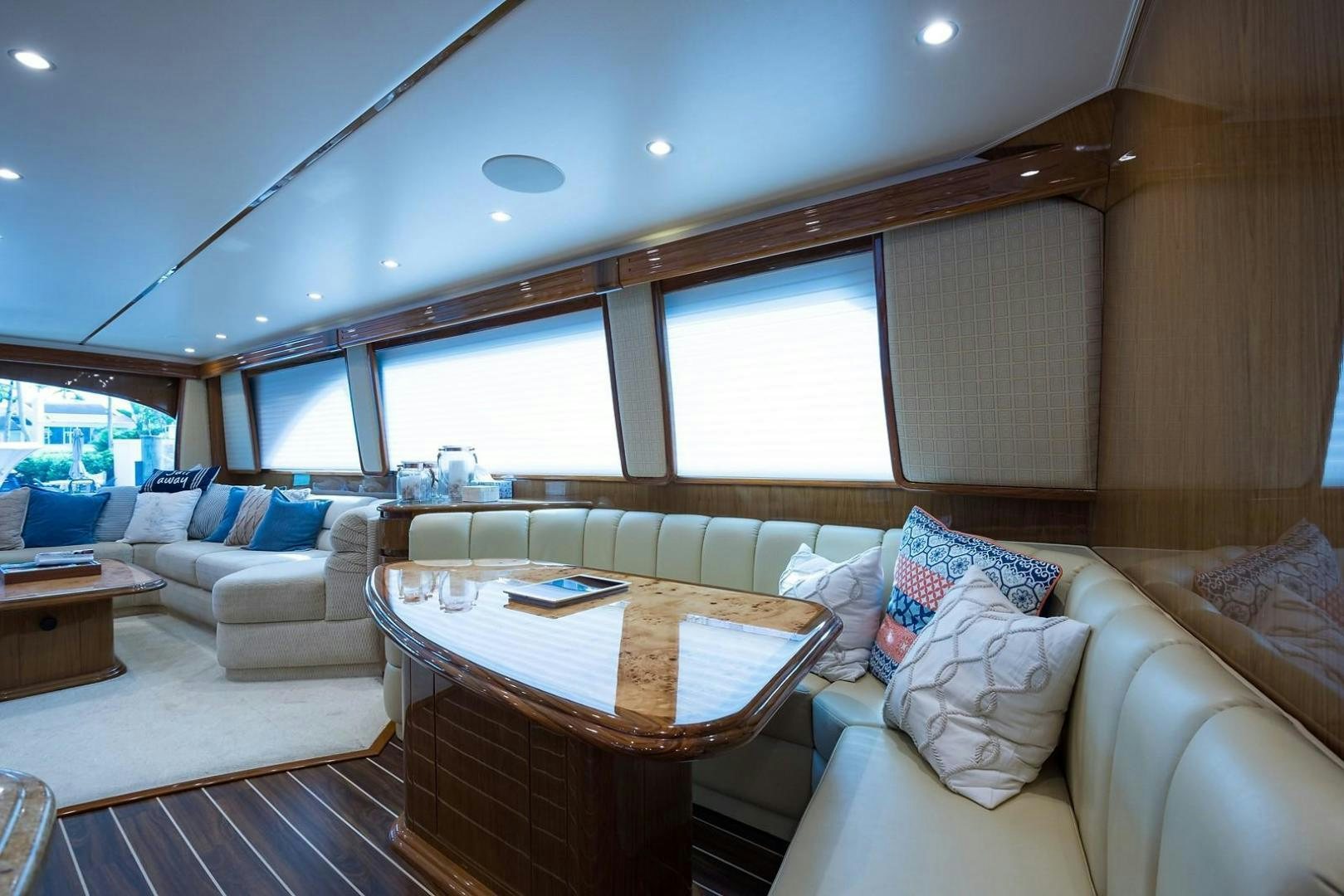 a living room with a couch and a table aboard NO NAME 82 Yacht for Sale
