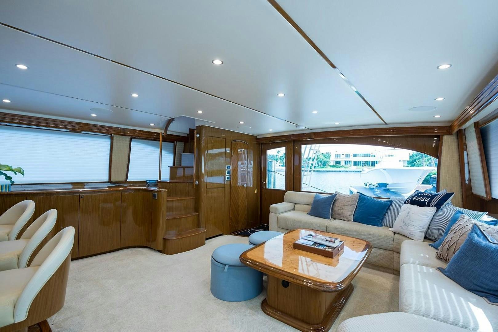 a living room with a couch and a table aboard NO NAME 82 Yacht for Sale