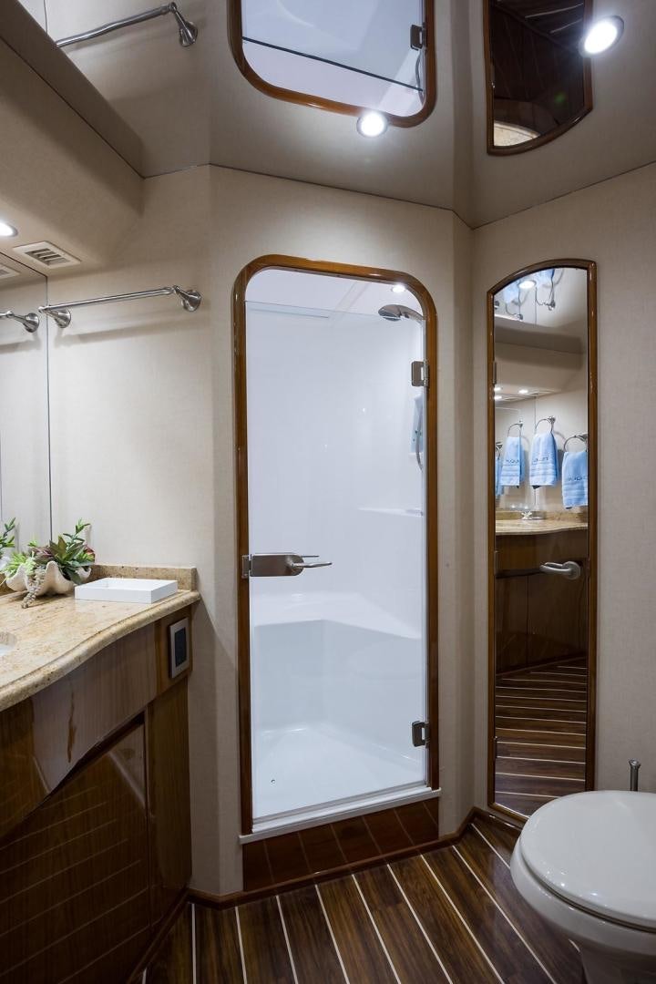 a bathroom with a glass shower door aboard NO NAME 82 Yacht for Sale