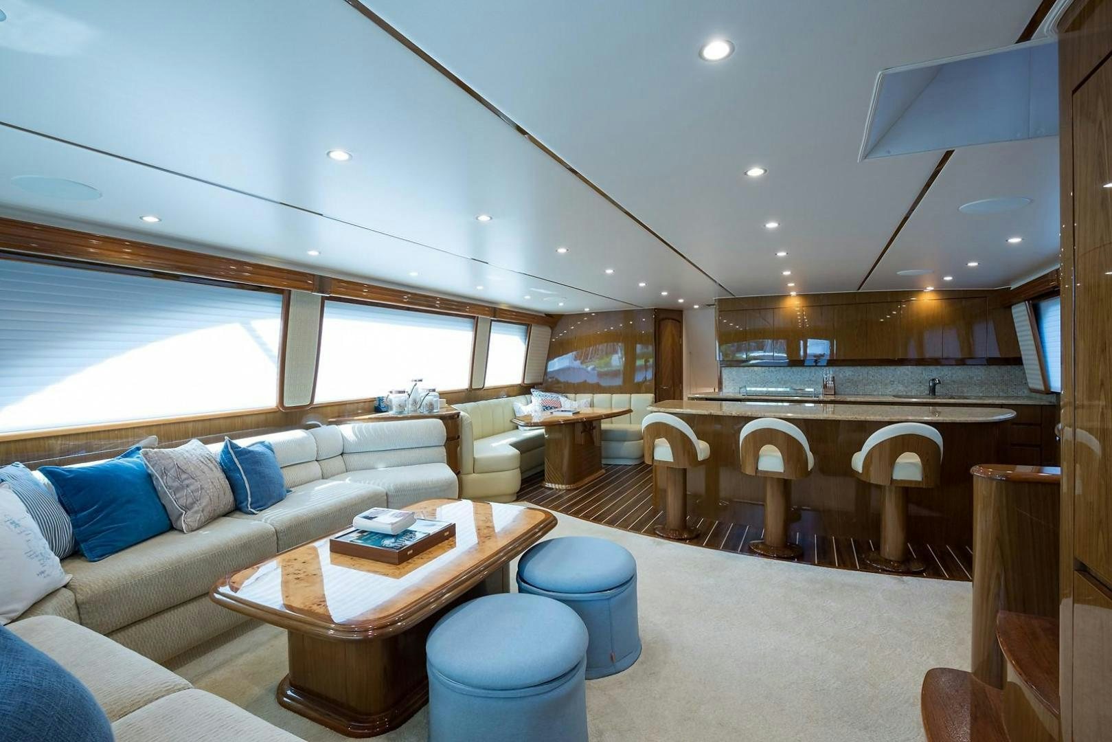 a living room with a couch and a table aboard NO NAME 82 Yacht for Sale