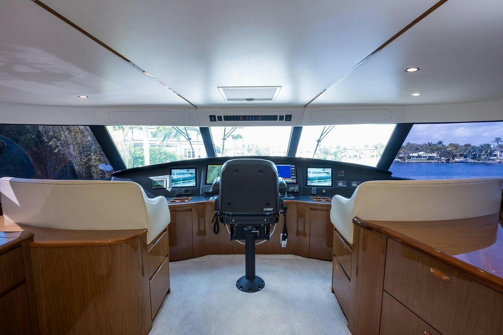 a room with a desk and chairs aboard NO NAME 82 Yacht for Sale