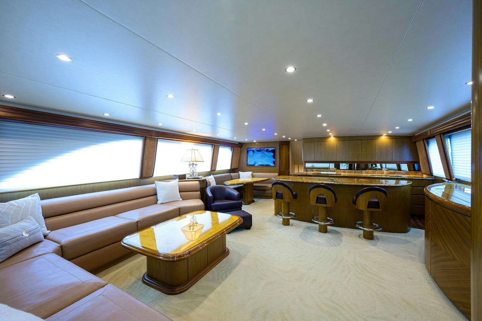 a large living room with a large window aboard RITE ANGLER Yacht for Sale
