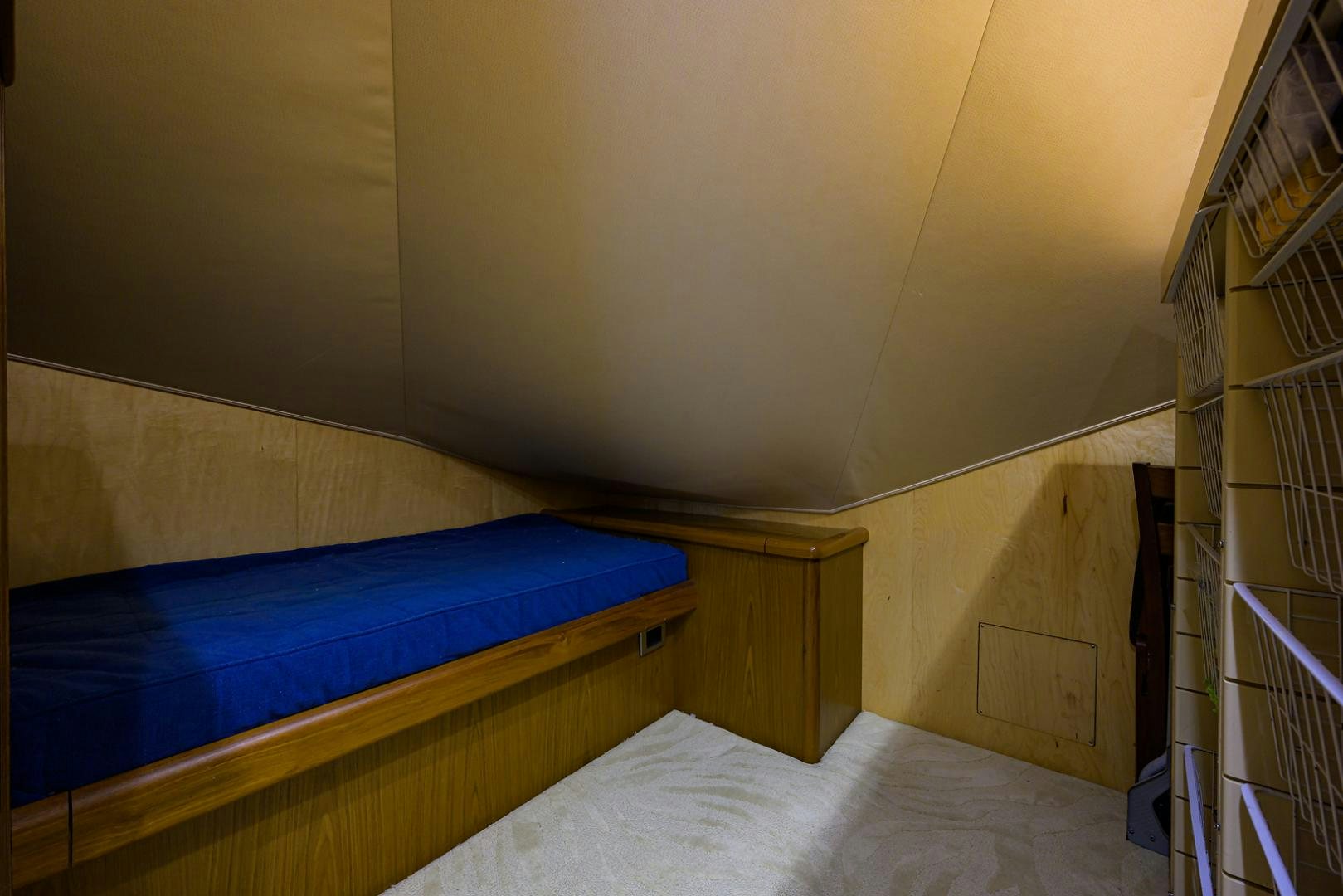 a bed in a room aboard RITE ANGLER Yacht for Sale