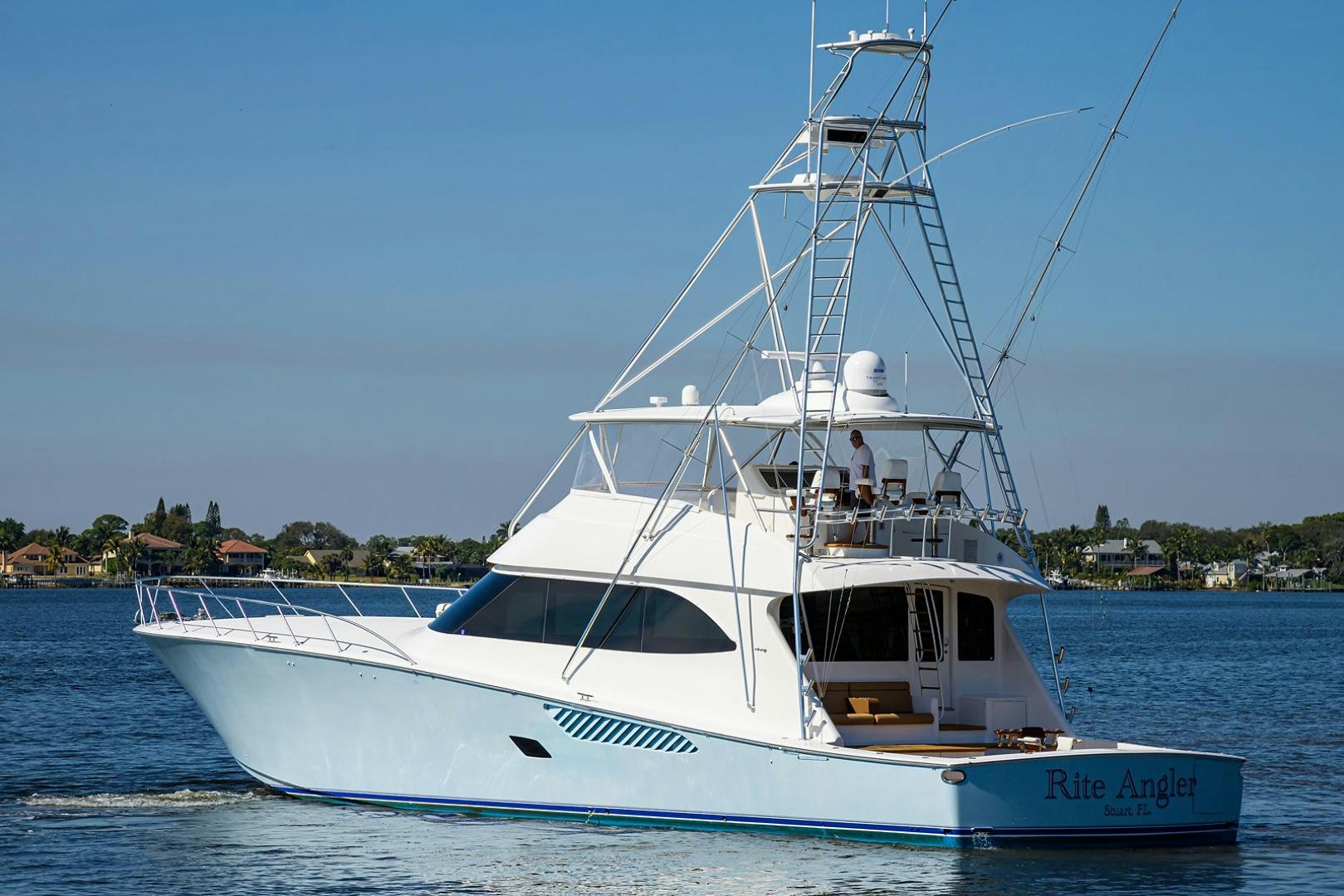 a white boat on the water aboard RITE ANGLER Yacht for Sale
