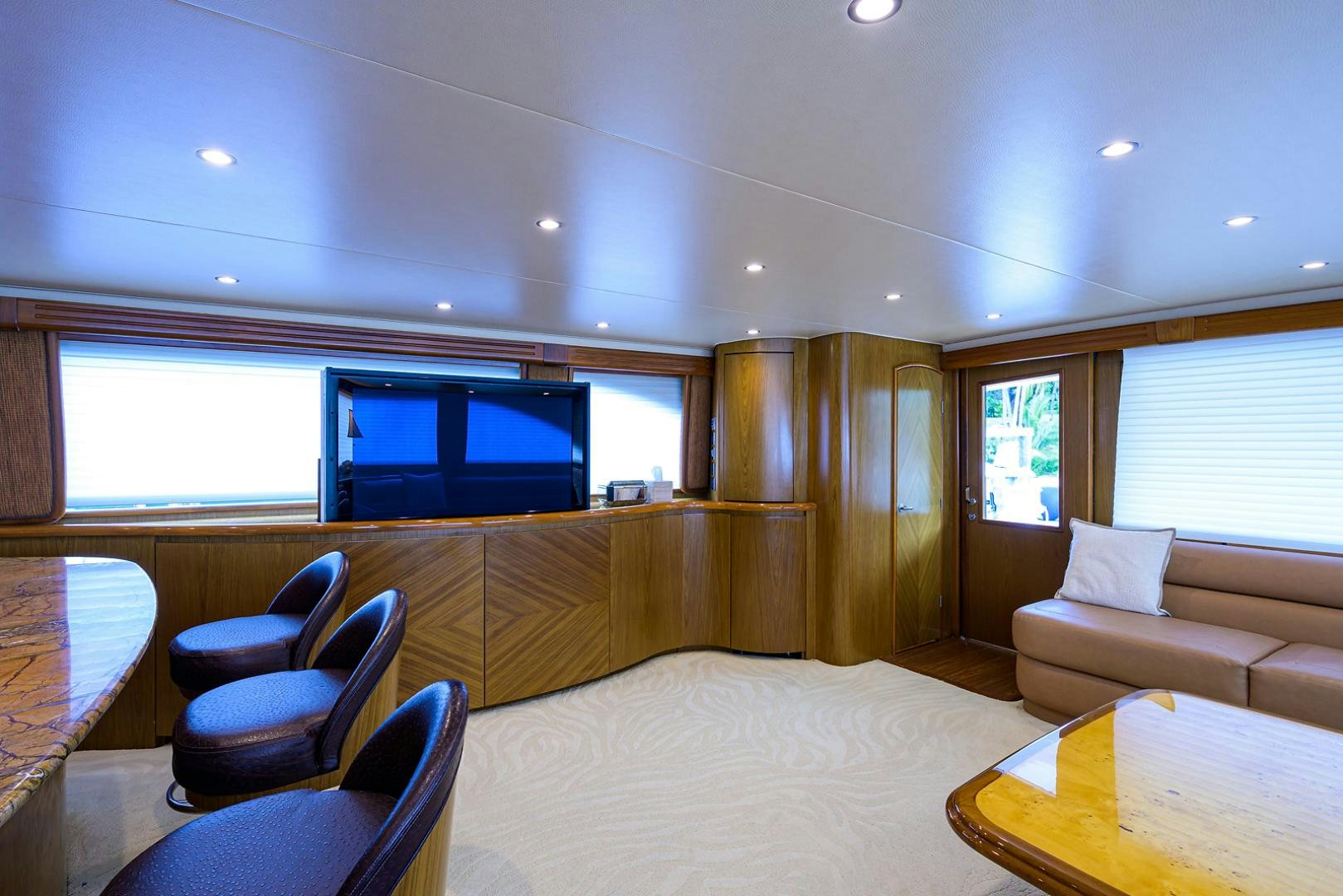 a room with a bed and a tv aboard RITE ANGLER Yacht for Sale