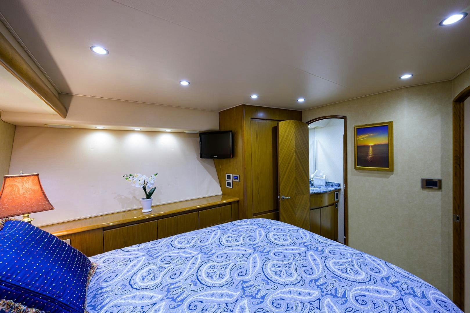 a hotel room with a bed aboard RITE ANGLER Yacht for Sale
