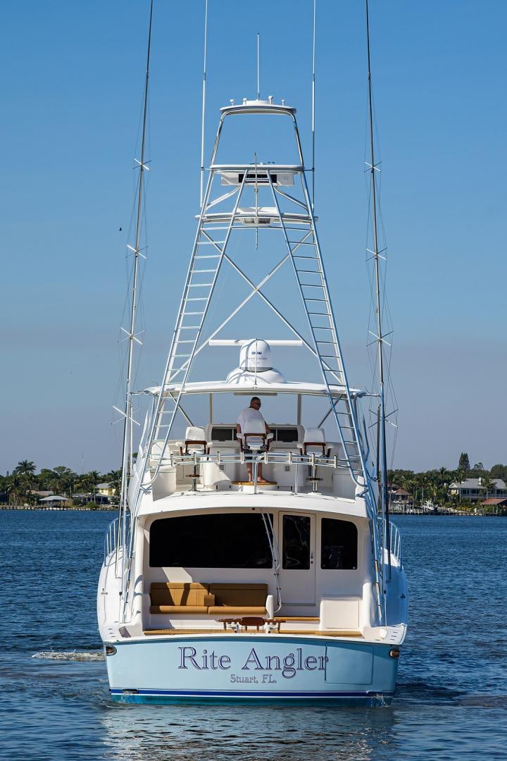 a white boat on the water aboard RITE ANGLER Yacht for Sale