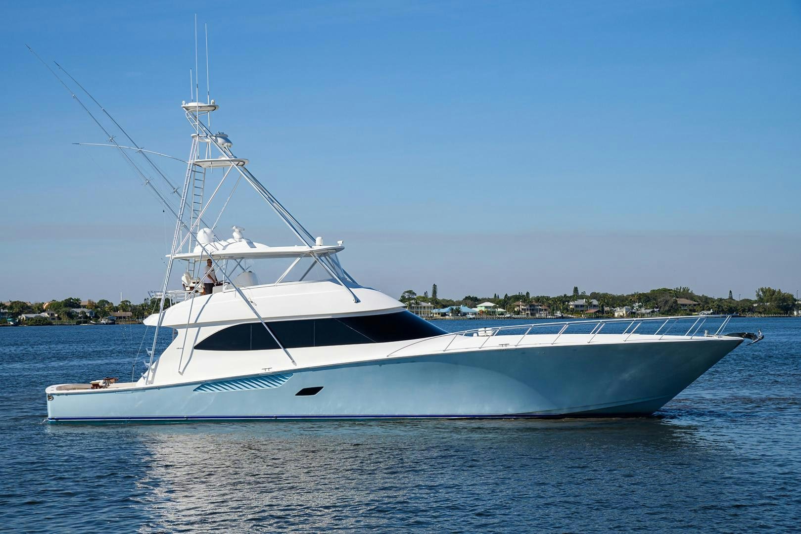 a white boat on the water aboard RITE ANGLER Yacht for Sale