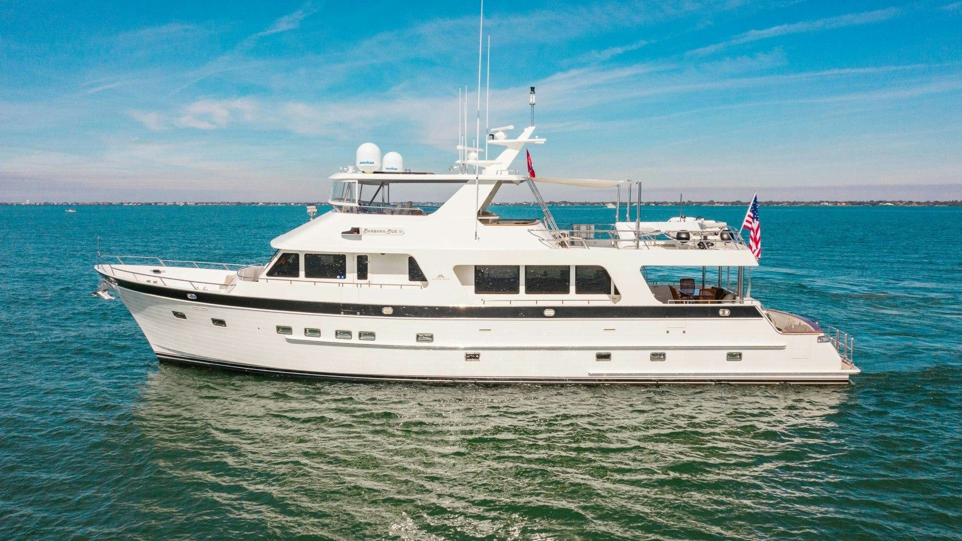 a white yacht in the water aboard BARBARA SUE II Yacht for Sale
