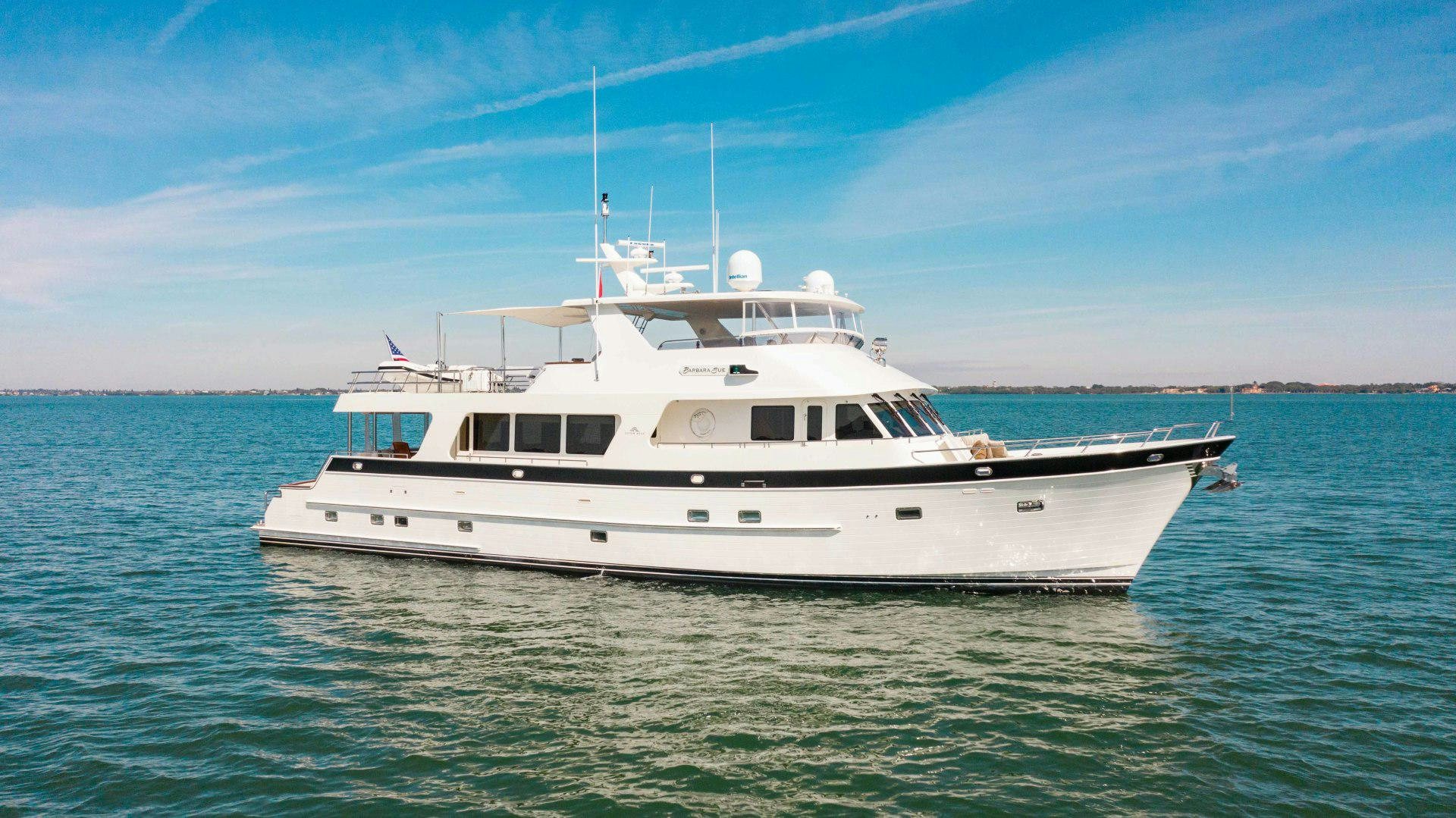 a white boat in the water aboard BARBARA SUE II Yacht for Sale