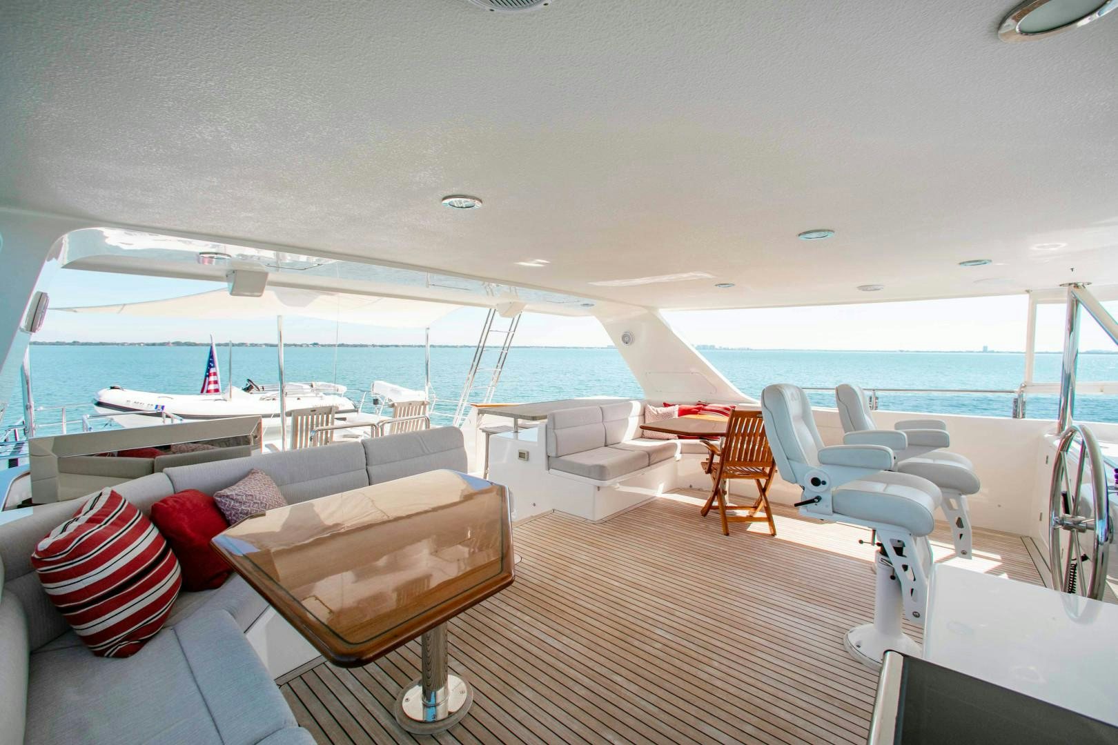 a room with a couch and a pool aboard BARBARA SUE II Yacht for Sale
