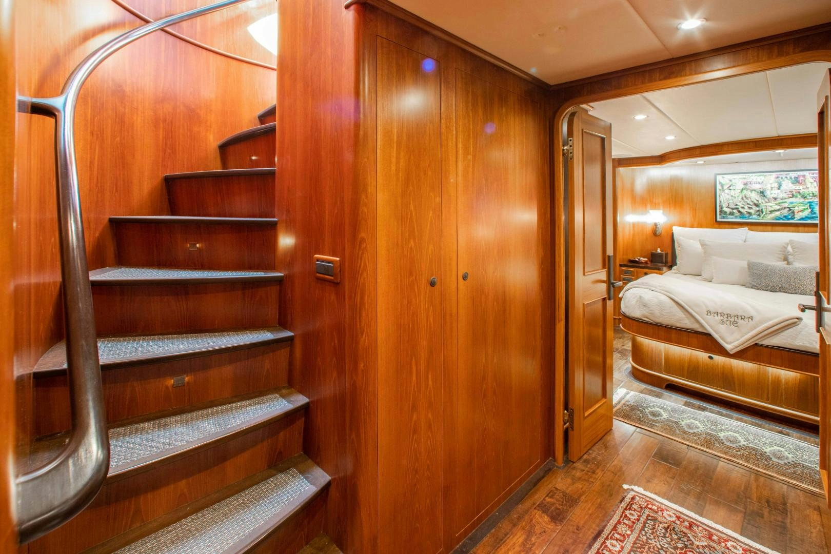 a wooden bunk bed in a room aboard BARBARA SUE II Yacht for Sale