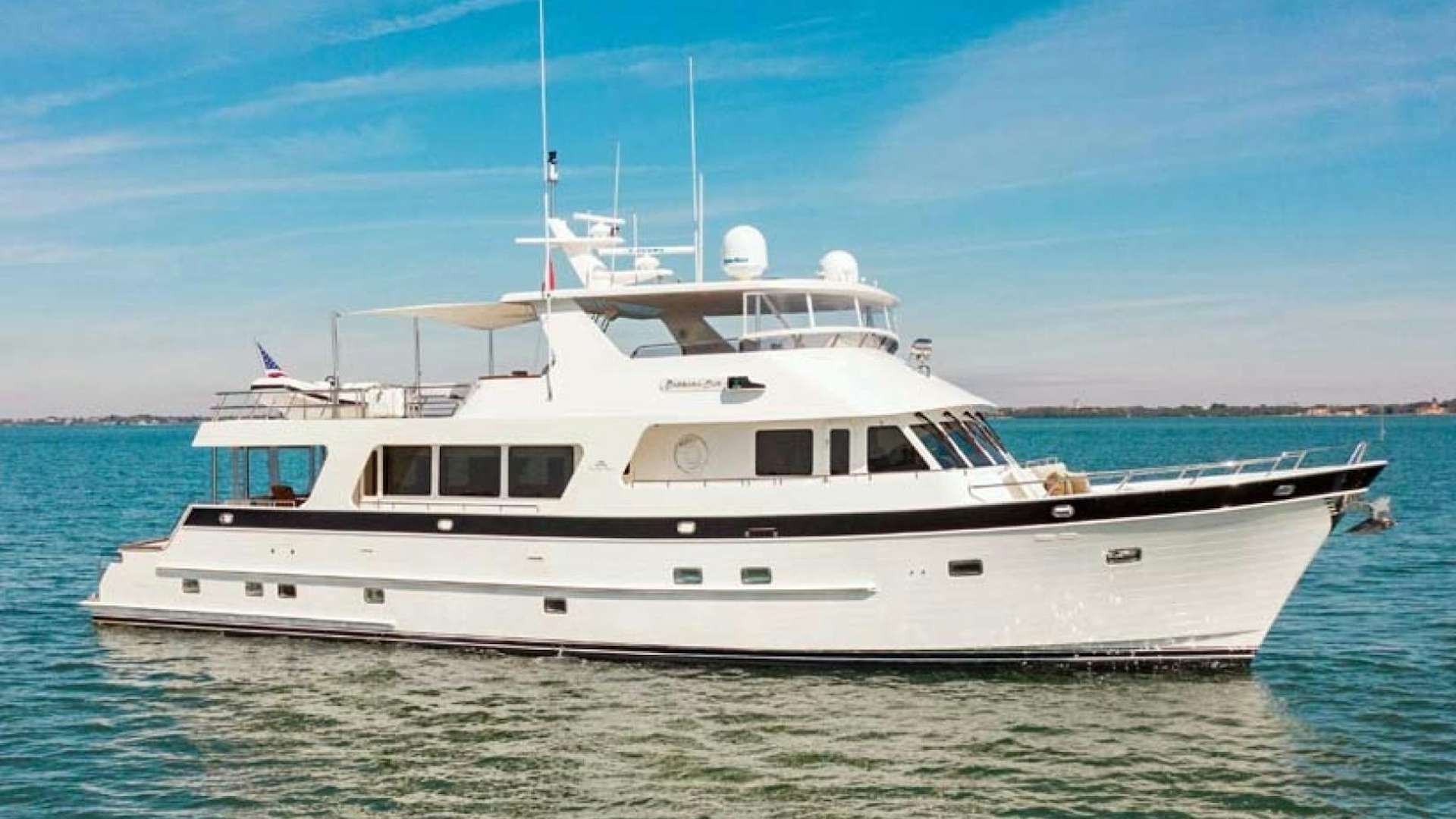 a white boat in the water aboard BARBARA SUE II Yacht for Sale