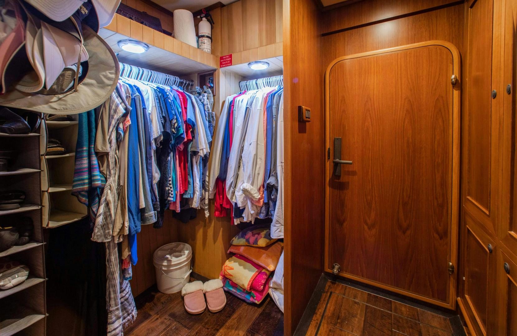 a closet full of clothes aboard BARBARA SUE II Yacht for Sale