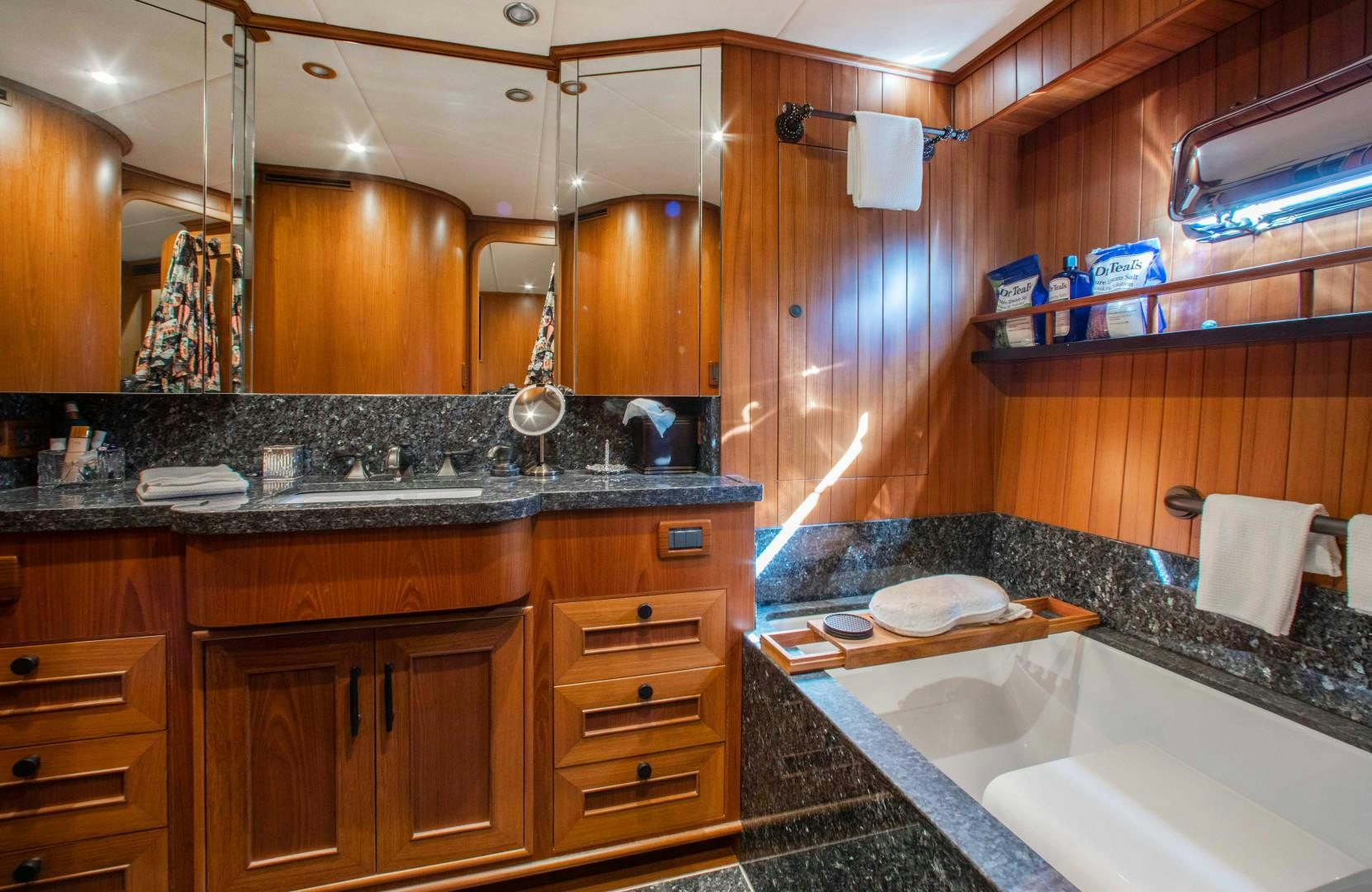 a bathroom with a large mirror aboard BARBARA SUE II Yacht for Sale