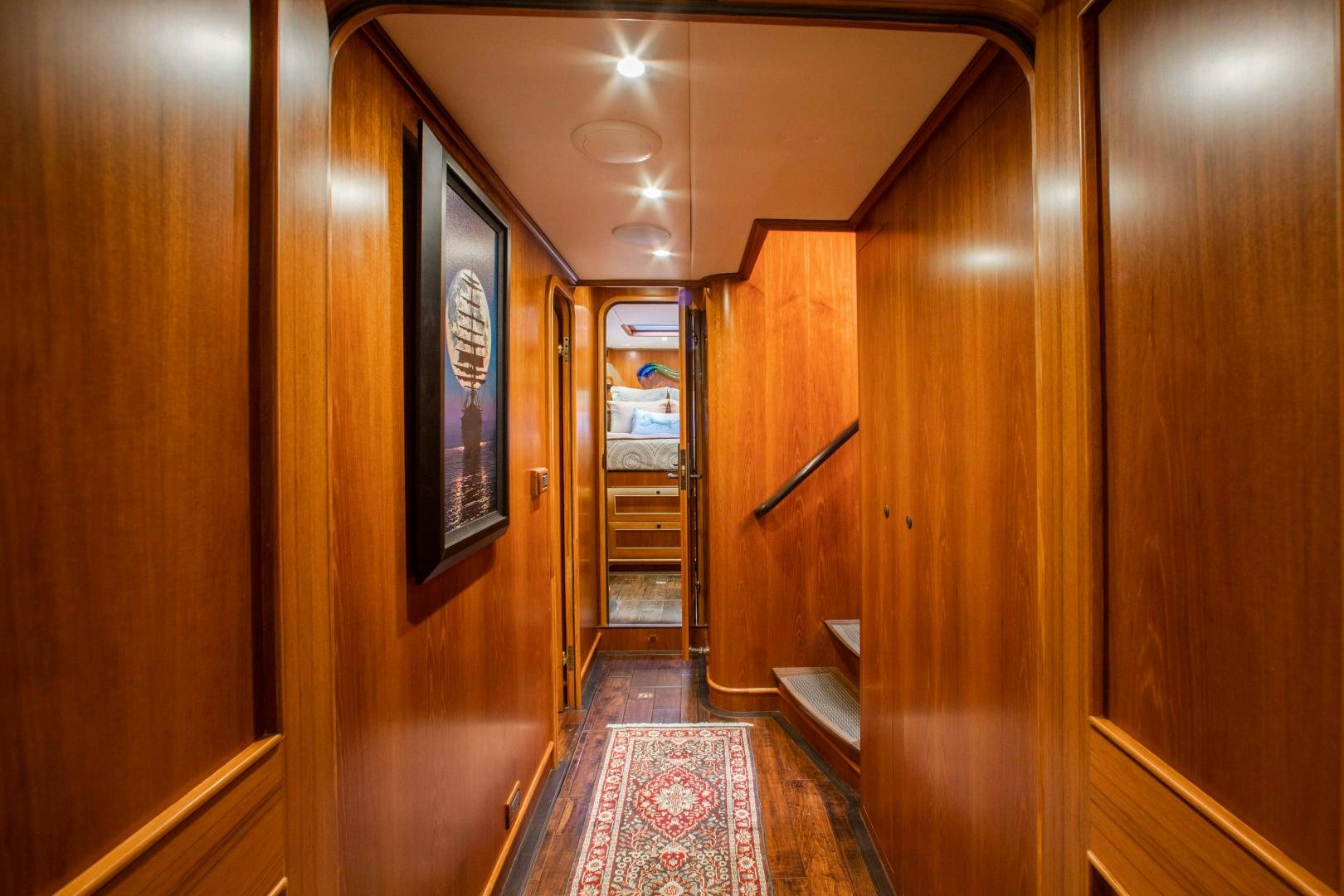 a hallway with wooden doors aboard BARBARA SUE II Yacht for Sale