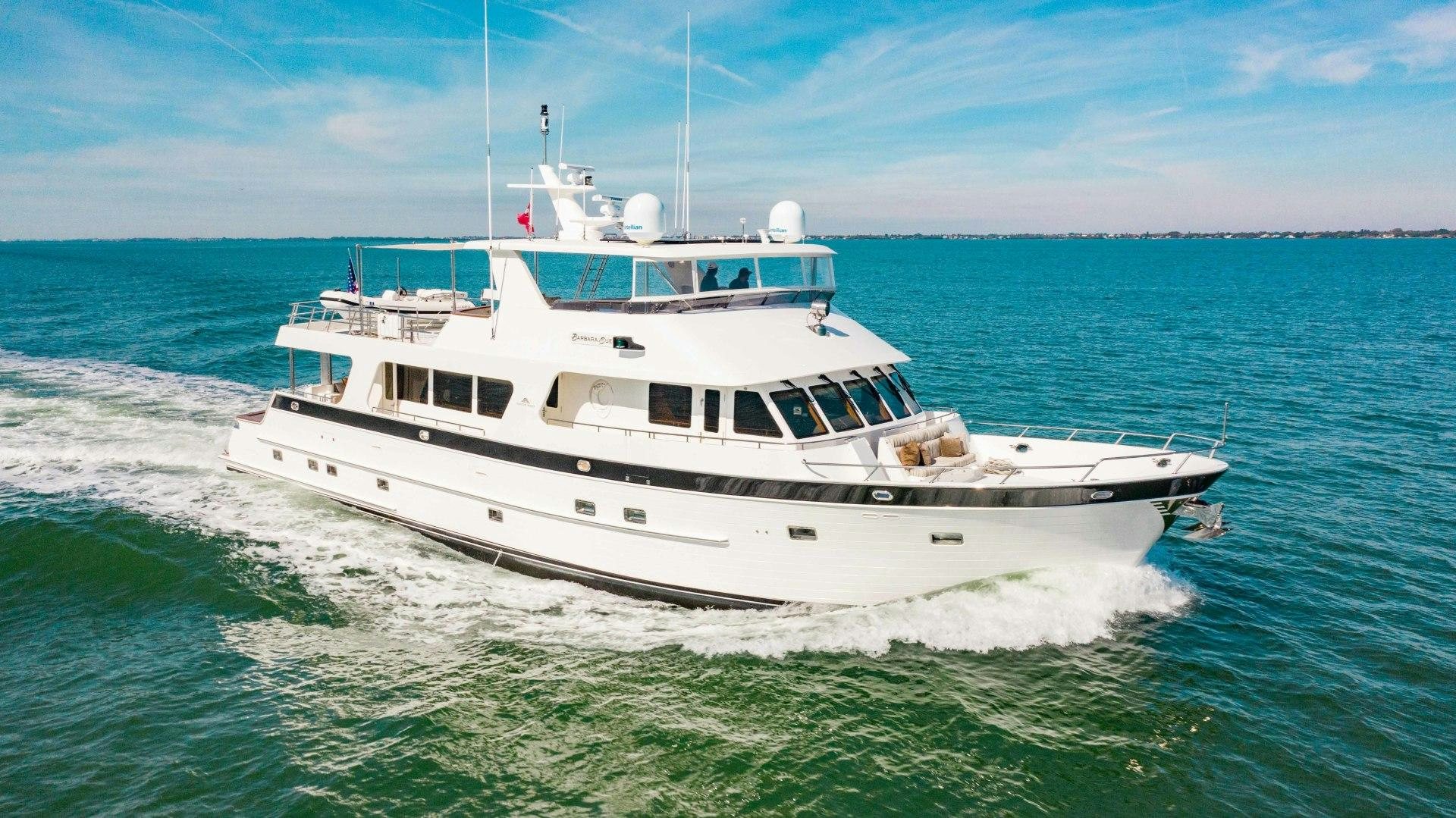 a white boat on the water aboard BARBARA SUE II Yacht for Sale