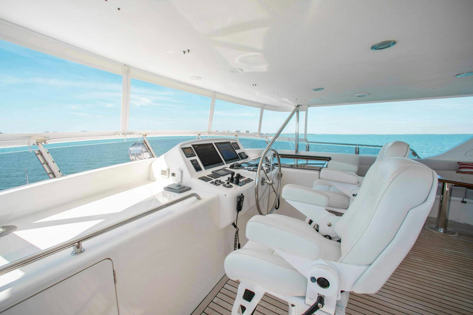 a boat with a couple of seats aboard BARBARA SUE II Yacht for Sale