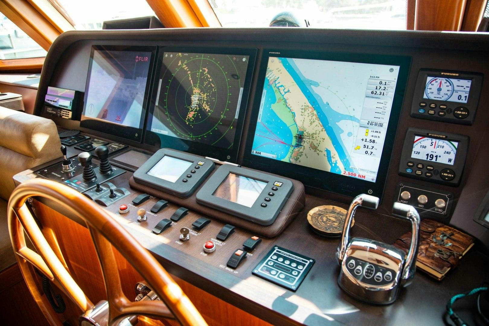 a table with electronic devices aboard BARBARA SUE II Yacht for Sale