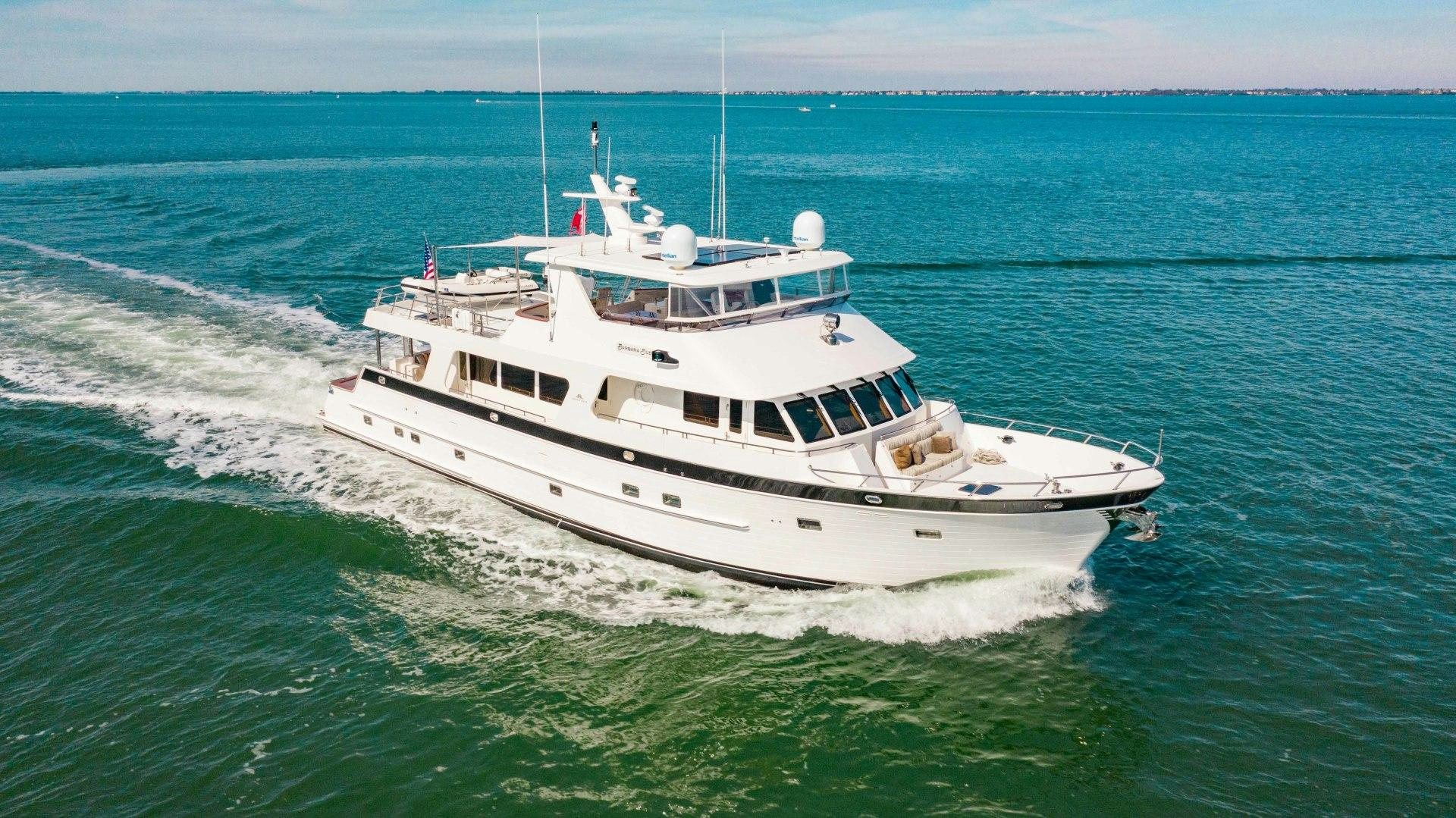 a white boat in the water aboard BARBARA SUE II Yacht for Sale