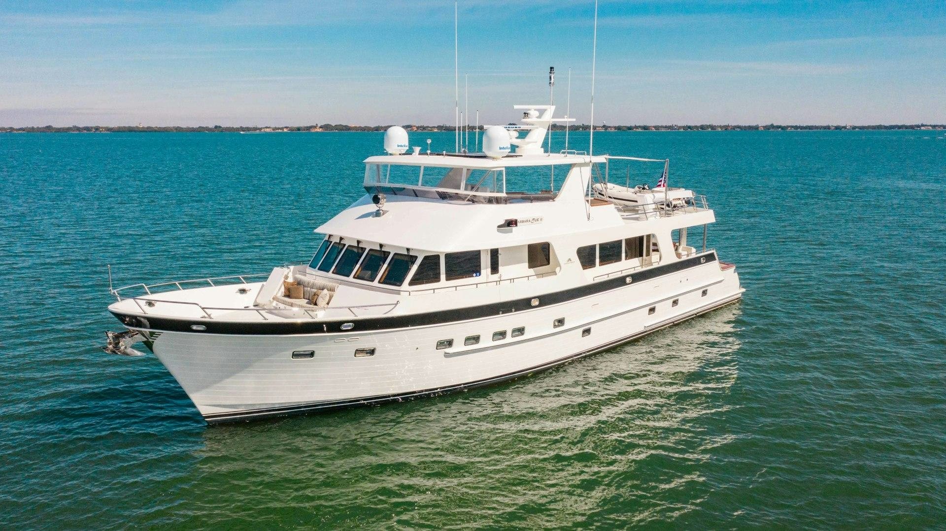 a white boat in the water aboard BARBARA SUE II Yacht for Sale
