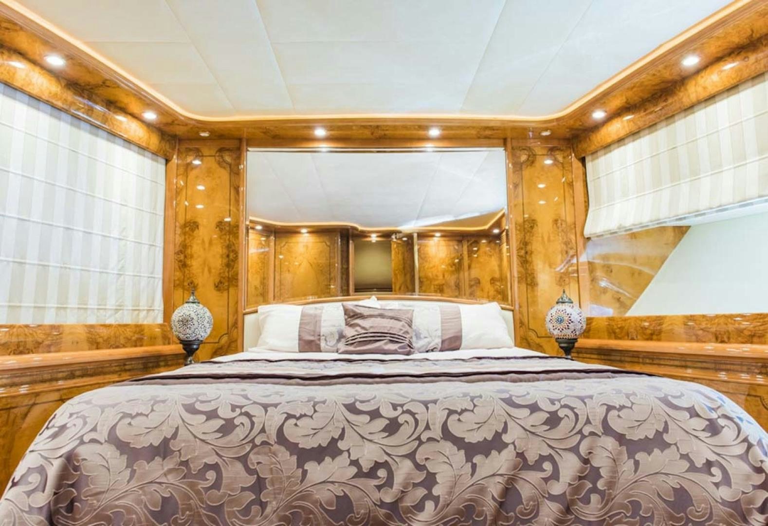 a bed with a large bed aboard HEMERA CUARTA Yacht for Sale