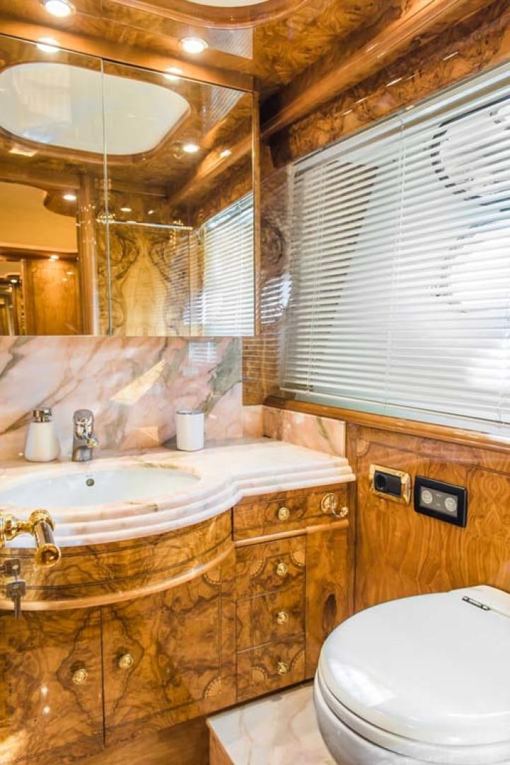 a bathroom with a sink and a toilet aboard HEMERA CUARTA Yacht for Sale