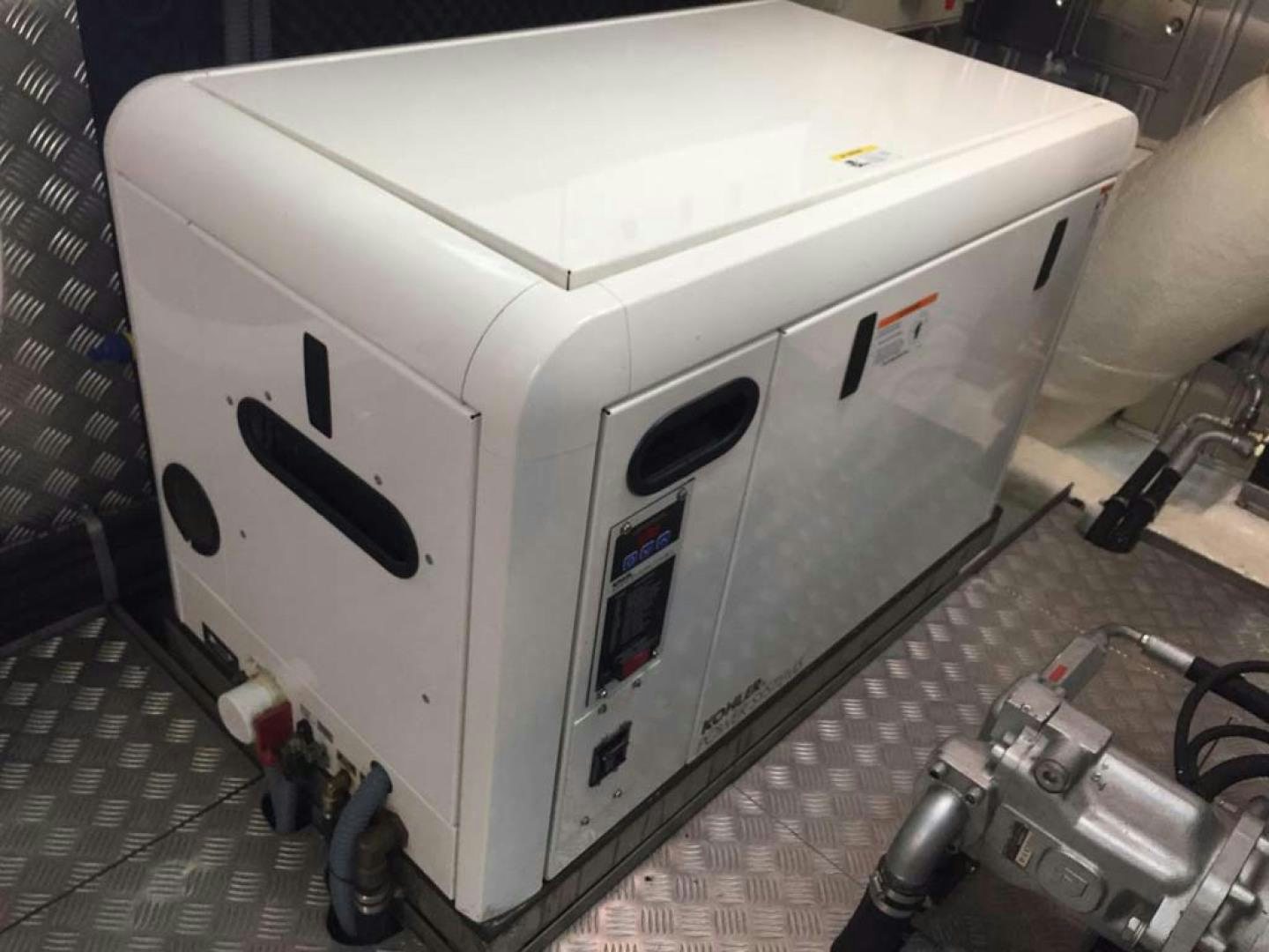 a white machine with black squares aboard HEMERA CUARTA Yacht for Sale