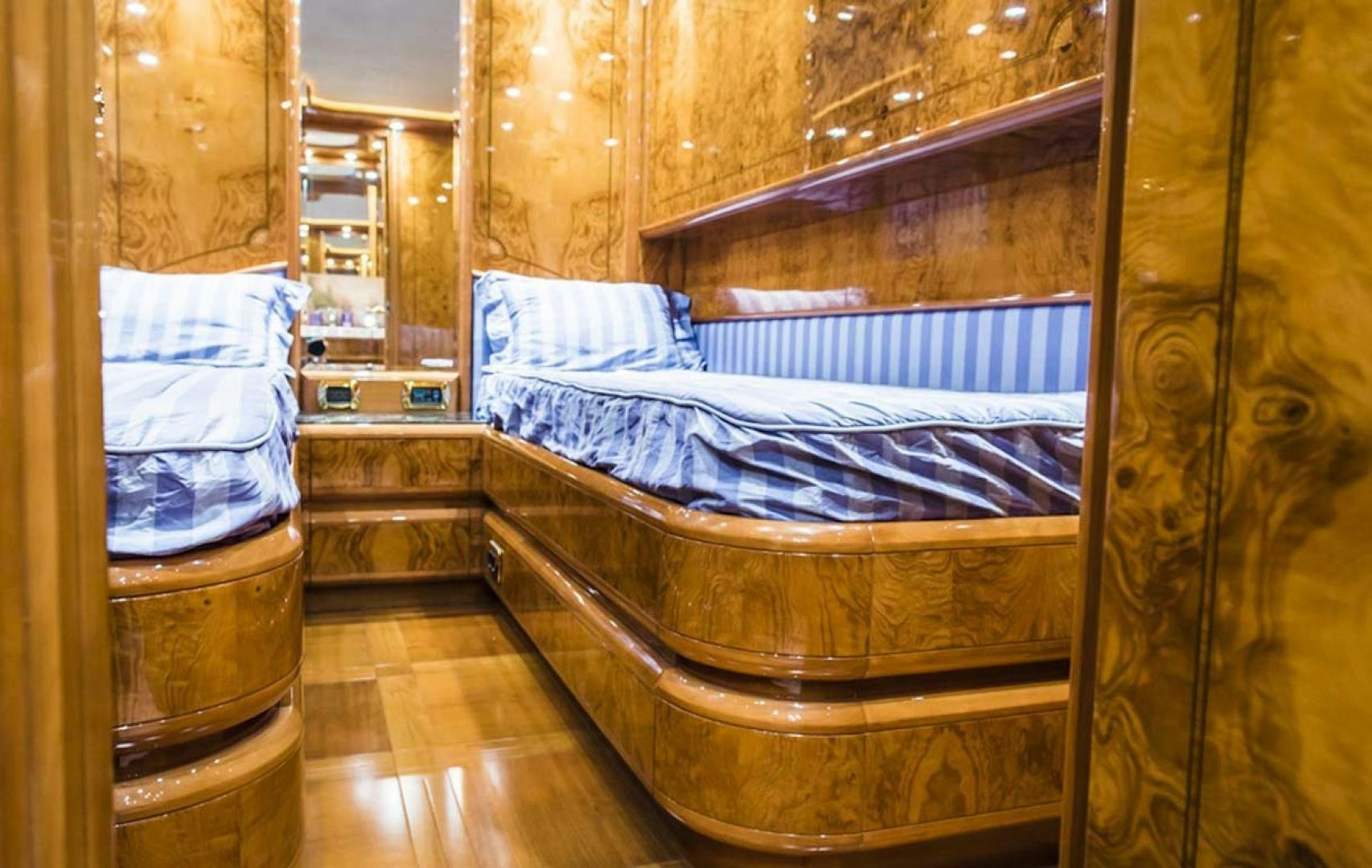 a bed in a room aboard HEMERA CUARTA Yacht for Sale
