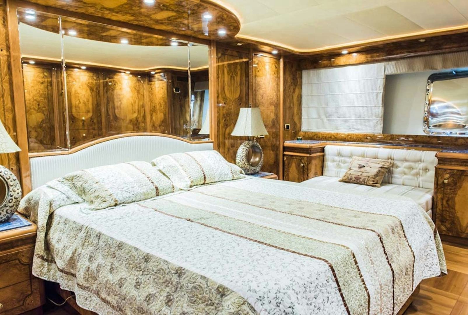 a bedroom with a large bed aboard HEMERA CUARTA Yacht for Sale