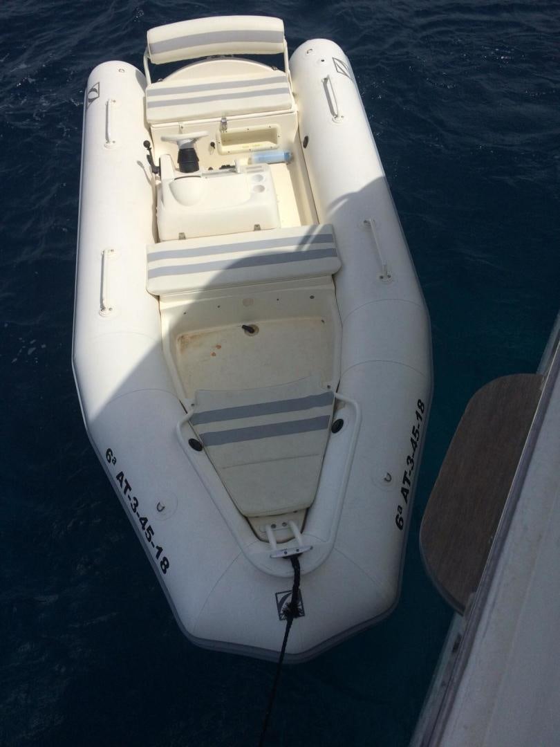 a white boat on the water aboard HEMERA CUARTA Yacht for Sale