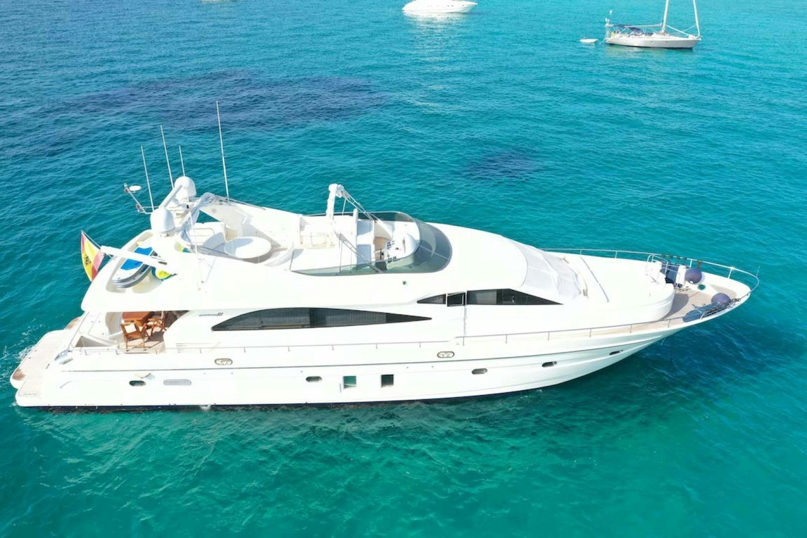 a white yacht in the water aboard HEMERA IV Yacht for Sale