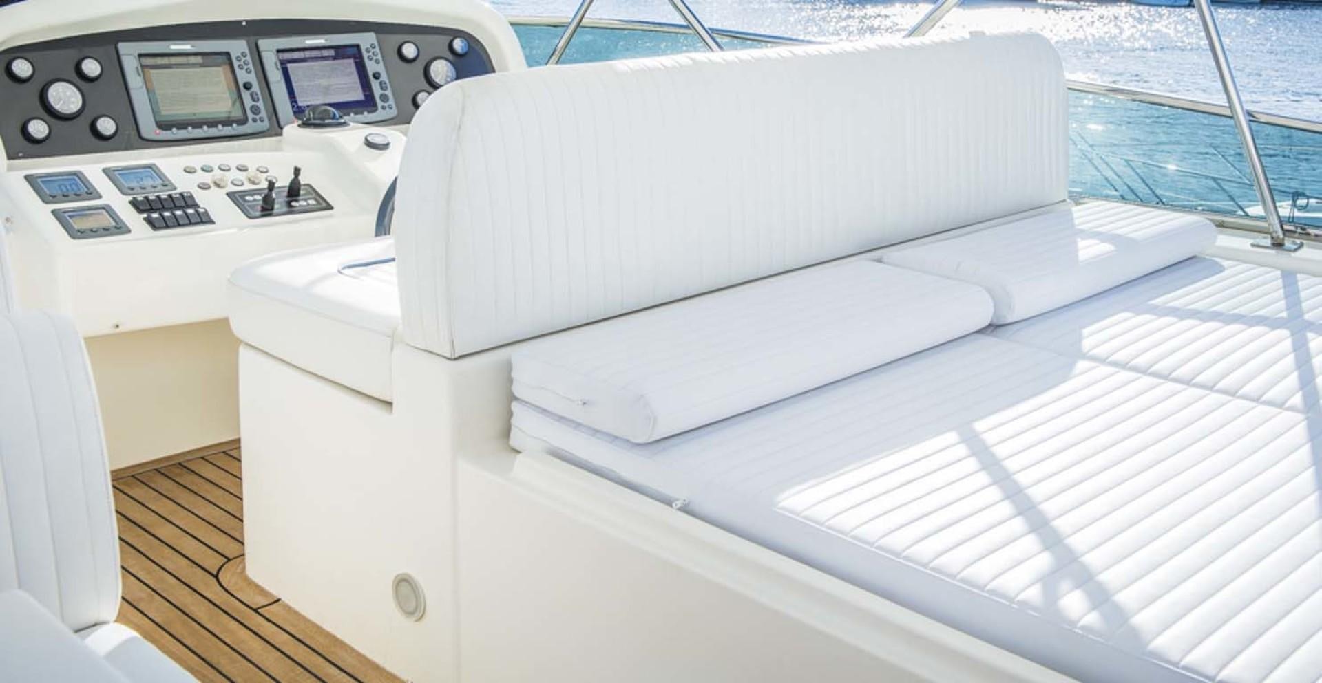 a boat with a computer and a printer aboard HEMERA CUARTA Yacht for Sale