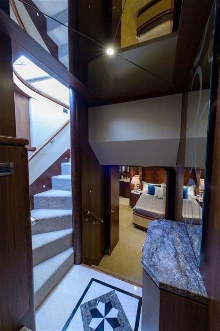 a hallway with a glass door aboard OCEANA Yacht for Sale