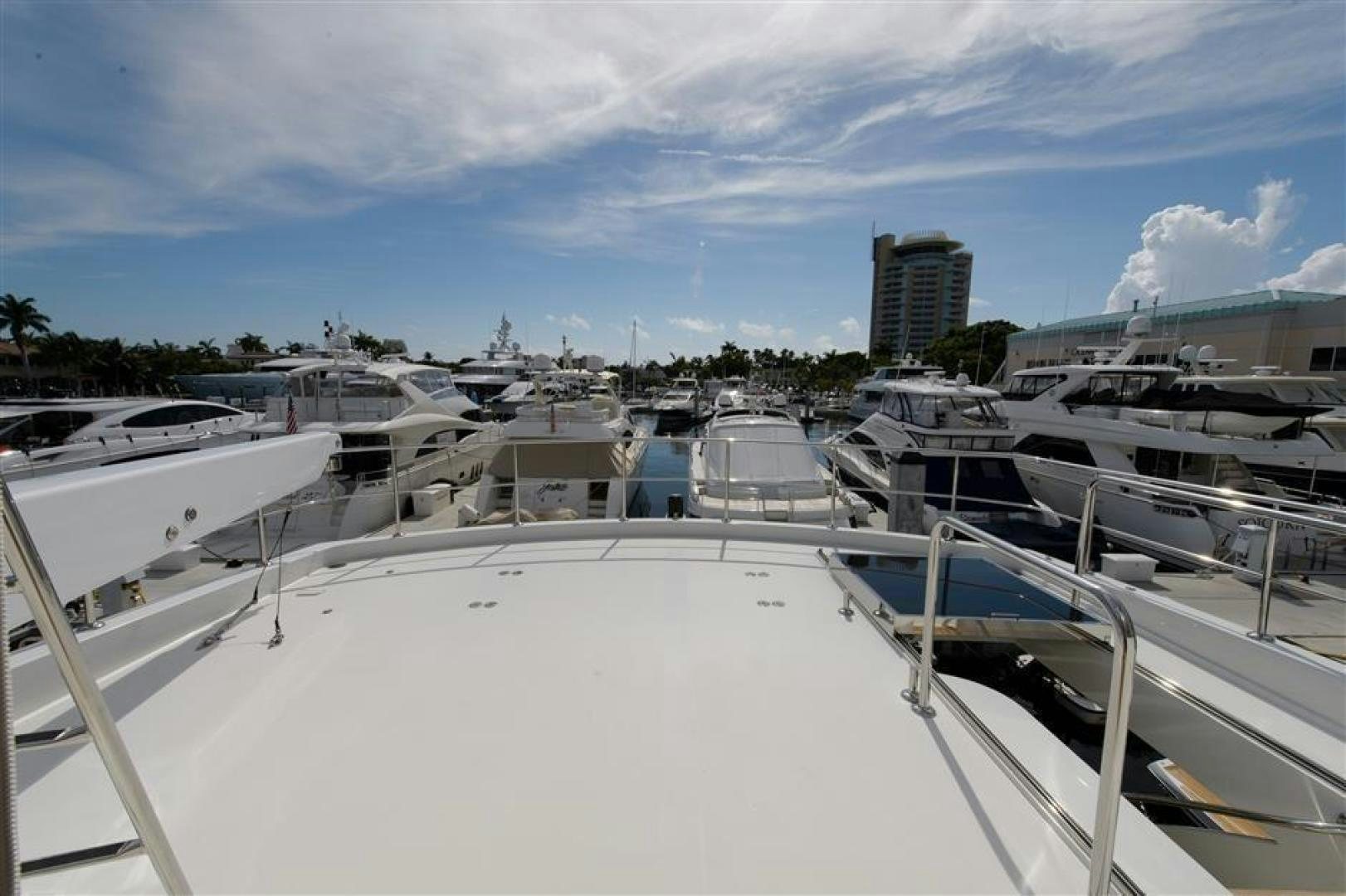 a group of boats are parked in a harbor aboard OCEANA Yacht for Sale