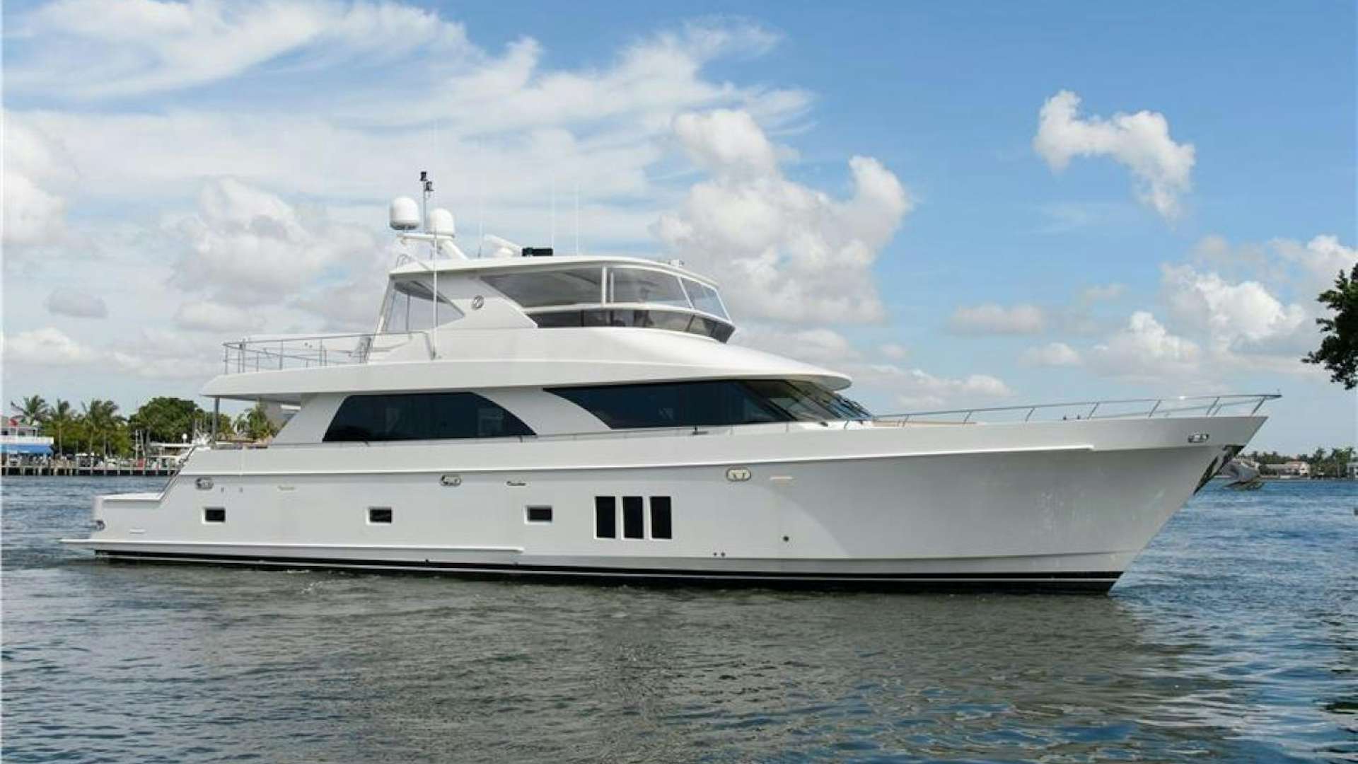 a white yacht in the water aboard OCEANA Yacht for Sale