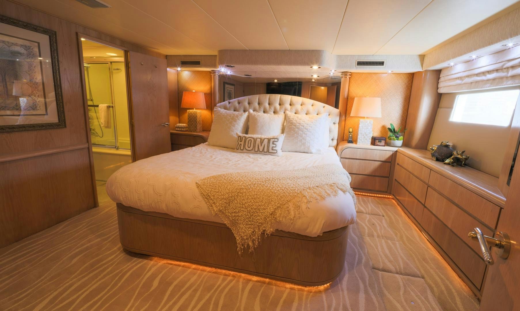 a large bed in a hotel room aboard LADY LILA Yacht for Sale