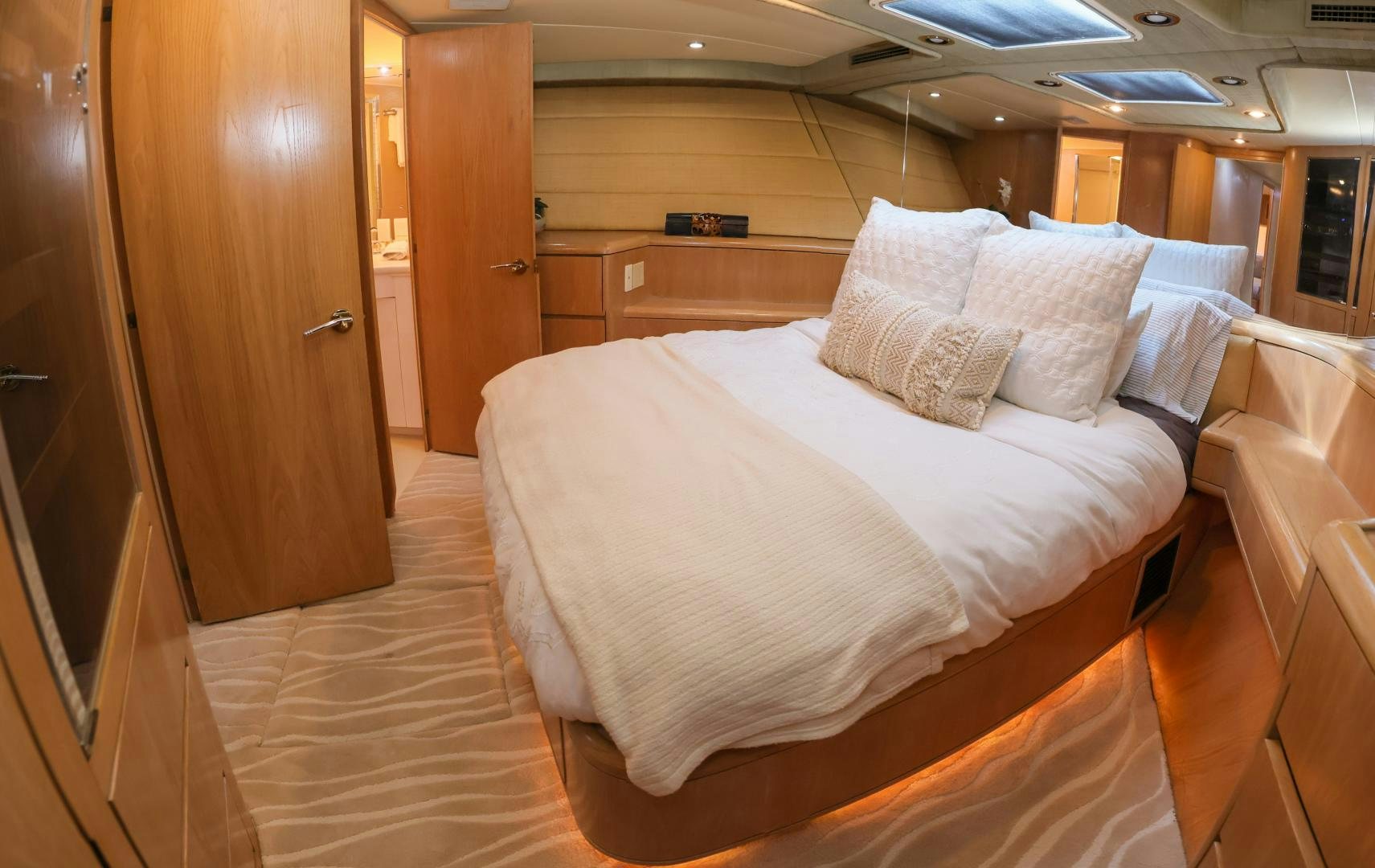 a bed in a room aboard LADY LILA Yacht for Sale