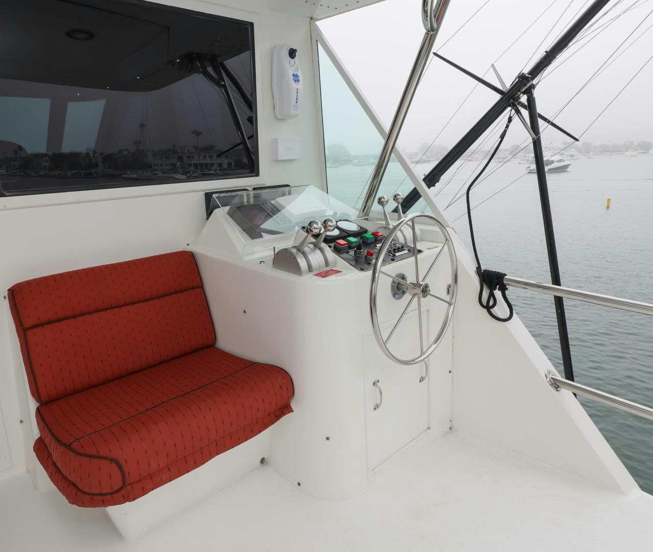 a boat with a seat and a couch on it aboard LADY LILA Yacht for Sale