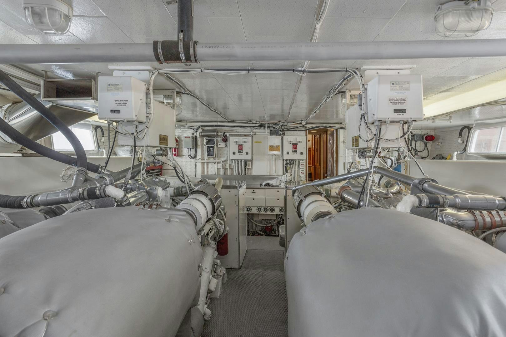 a room with several machines aboard ELEGANTE Yacht for Sale
