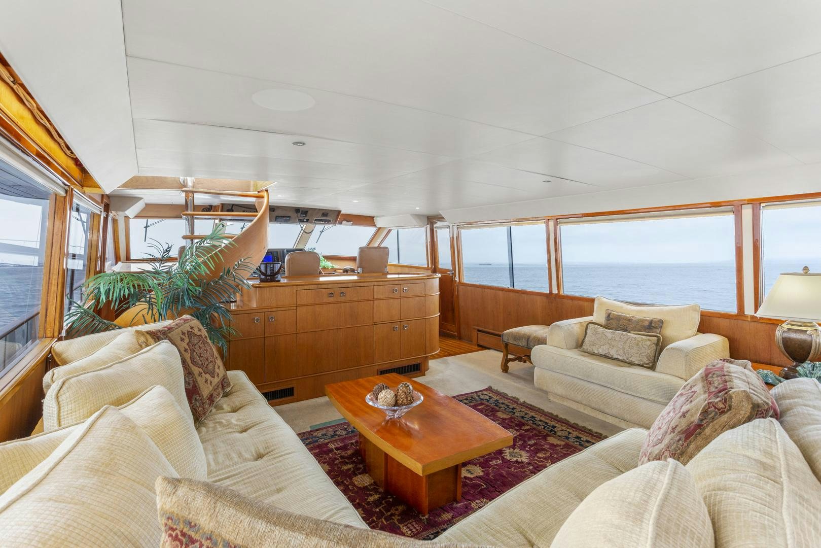 a living room with a large window aboard ELEGANTE Yacht for Sale