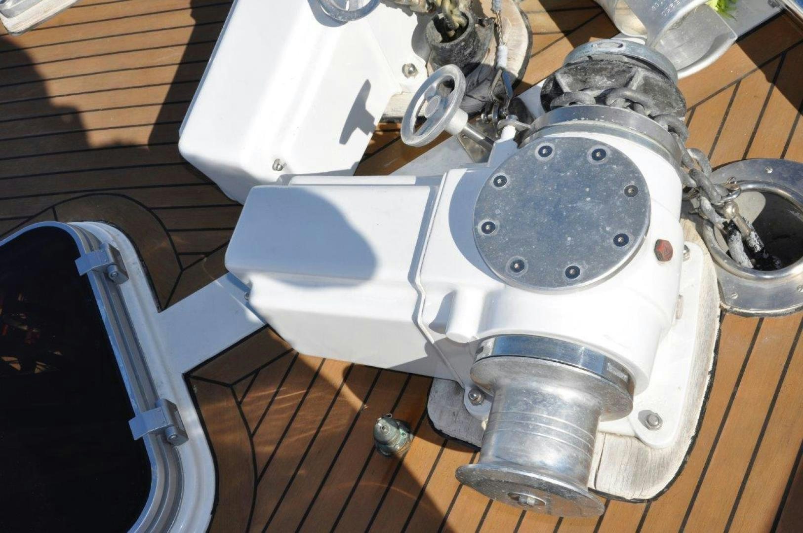 a broken toilet in a garage aboard M.I.S. MOONDANCE Yacht for Sale