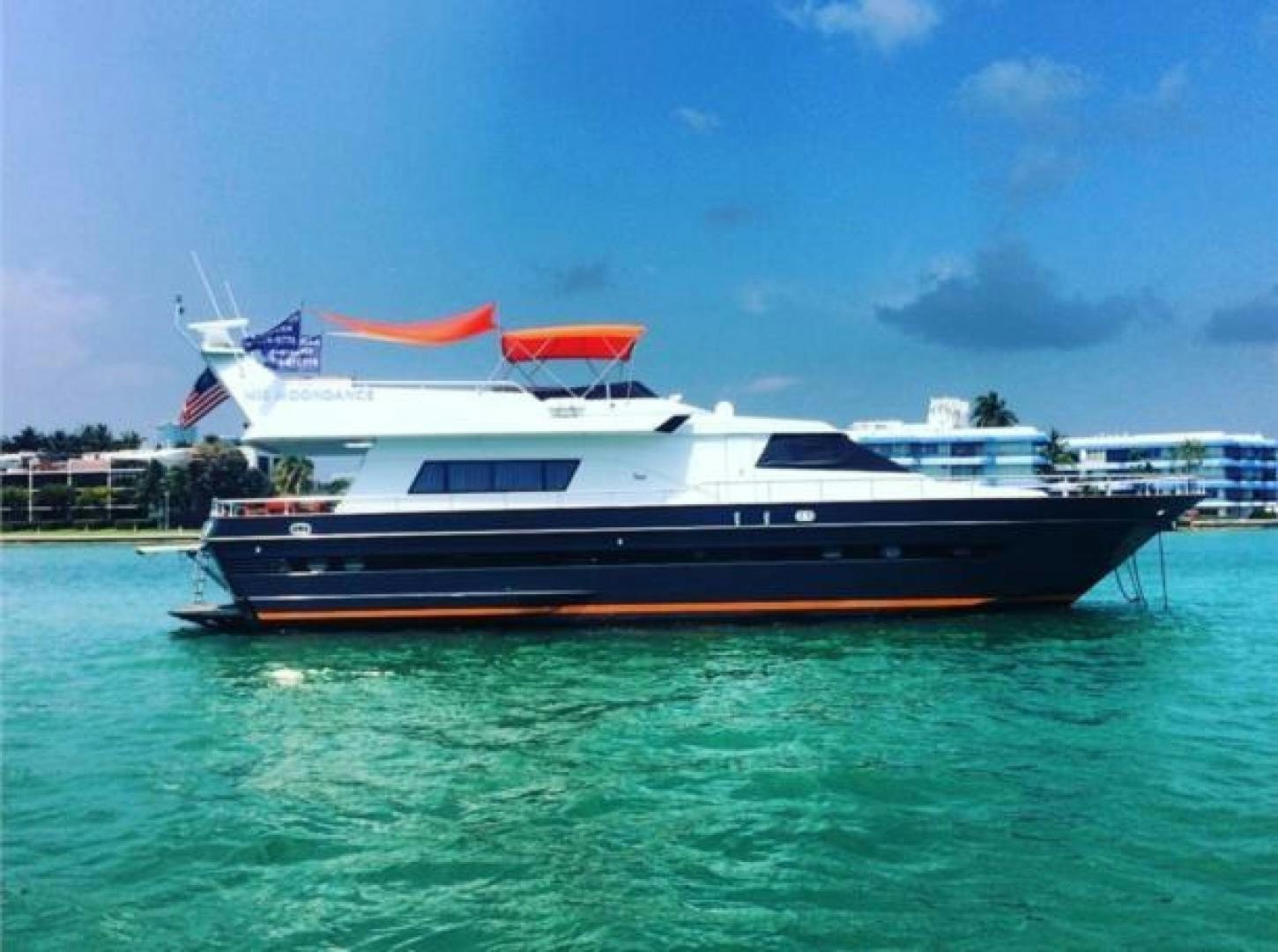 a large boat in the water aboard M.I.S. MOONDANCE Yacht for Sale