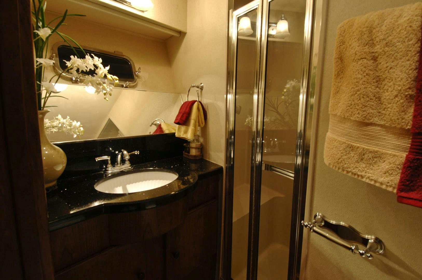 a bathroom with a sink and shower aboard LADY O Yacht for Sale