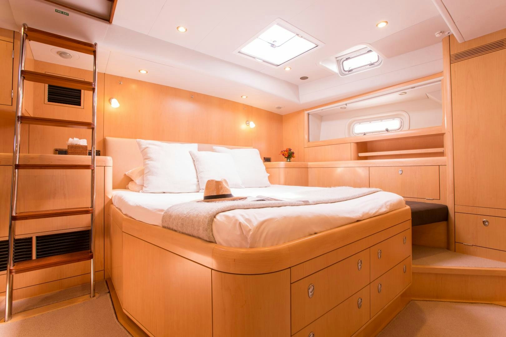 a room with a bed and a ladder aboard MATHILDA SOUND Yacht for Sale