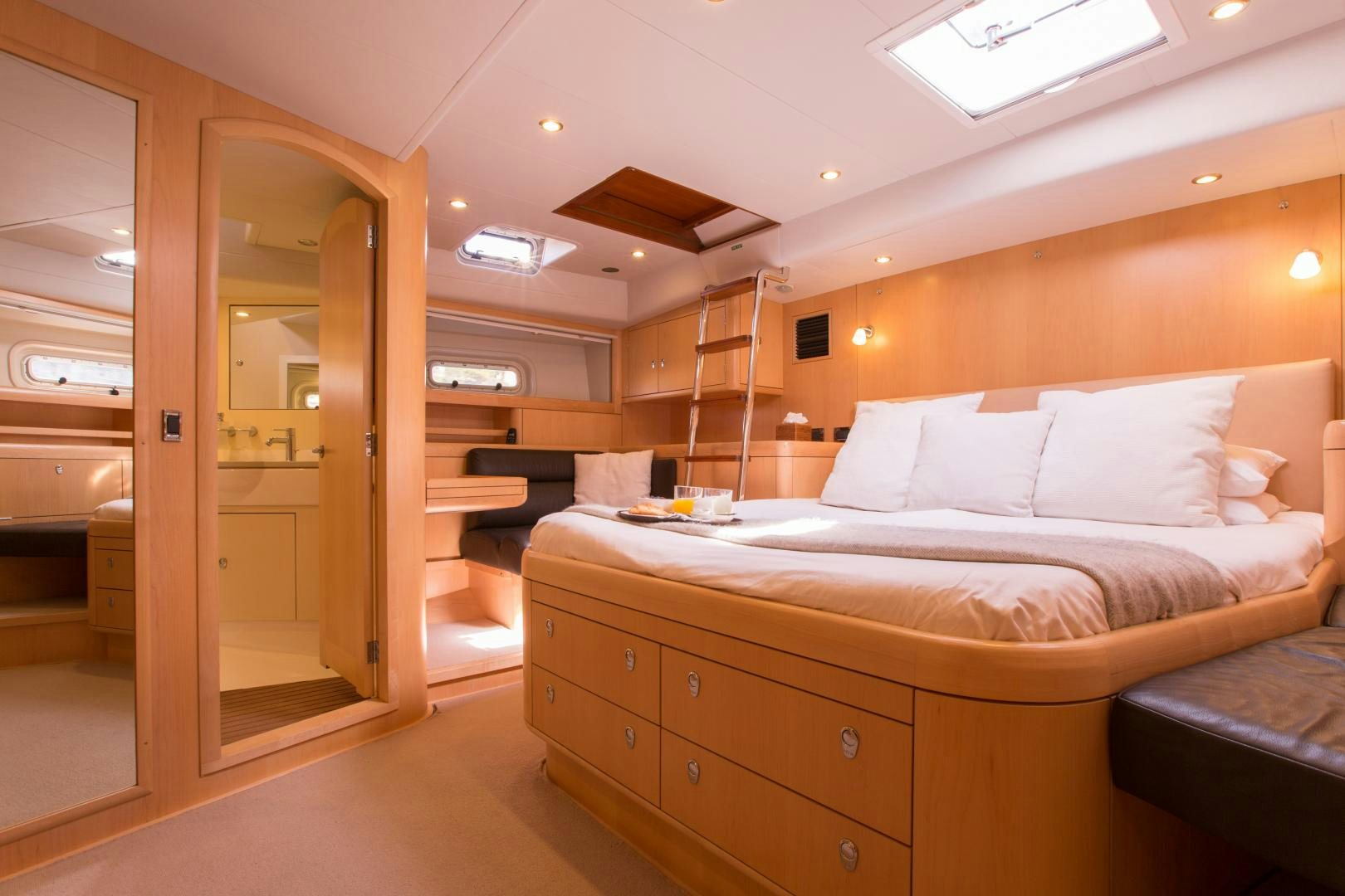 a room with a bed and a door aboard MATHILDA SOUND Yacht for Sale