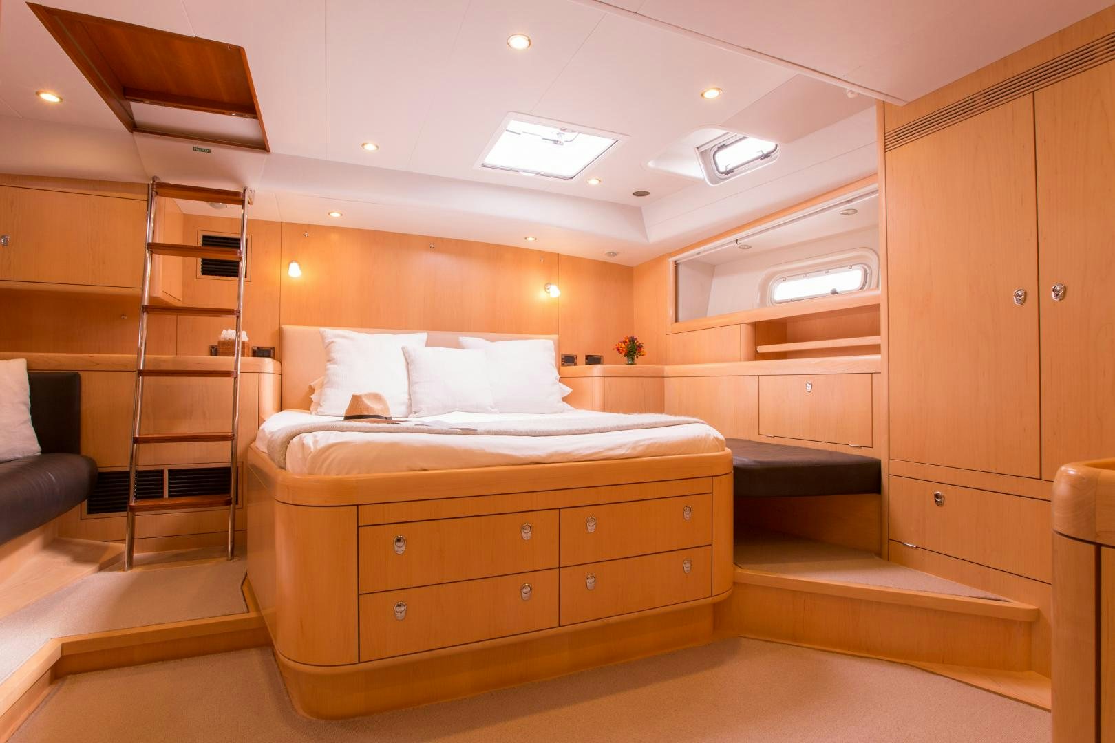 a room with a bed and a ladder aboard MATHILDA SOUND Yacht for Sale