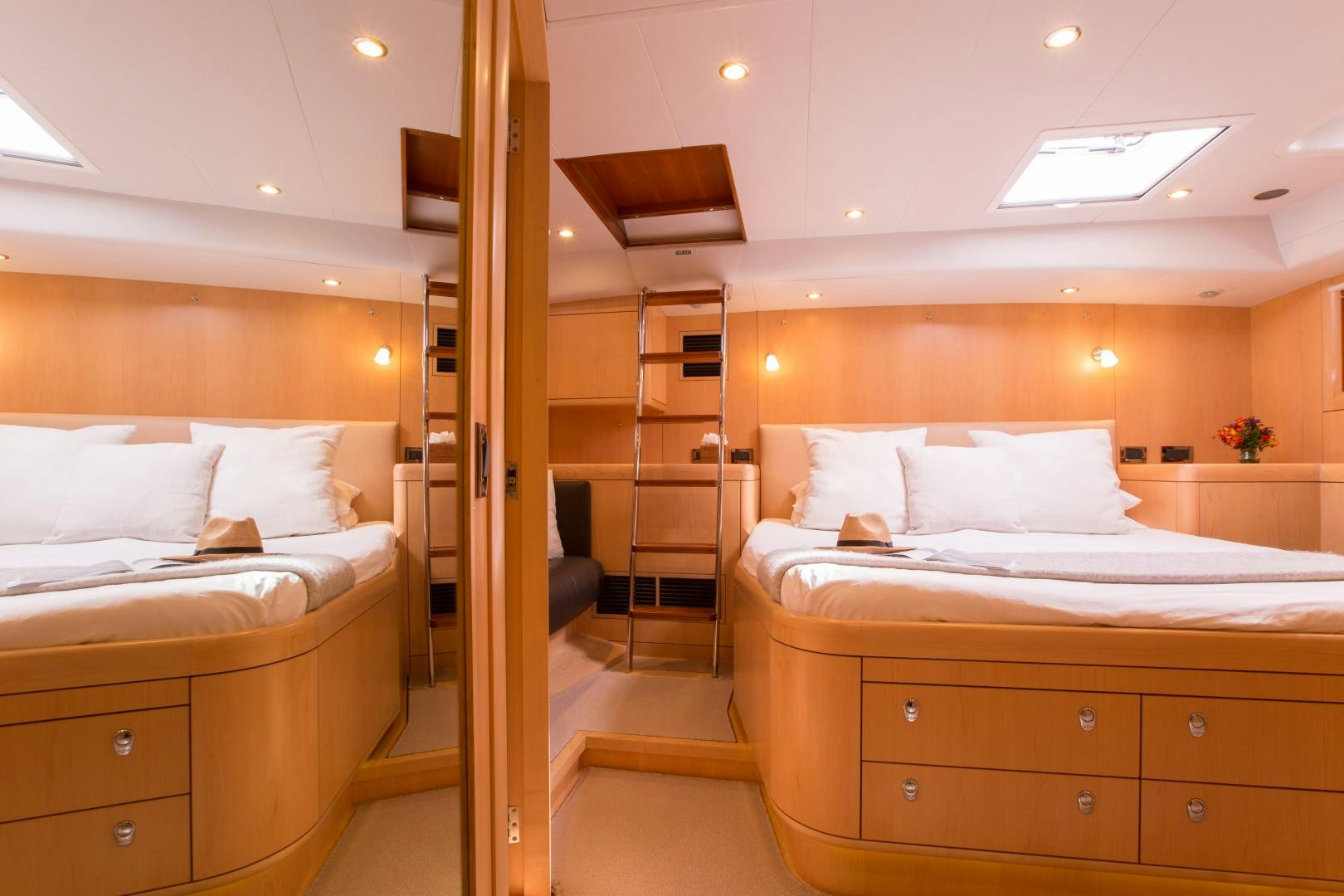 a room with a bed and a ladder aboard MATHILDA SOUND Yacht for Sale