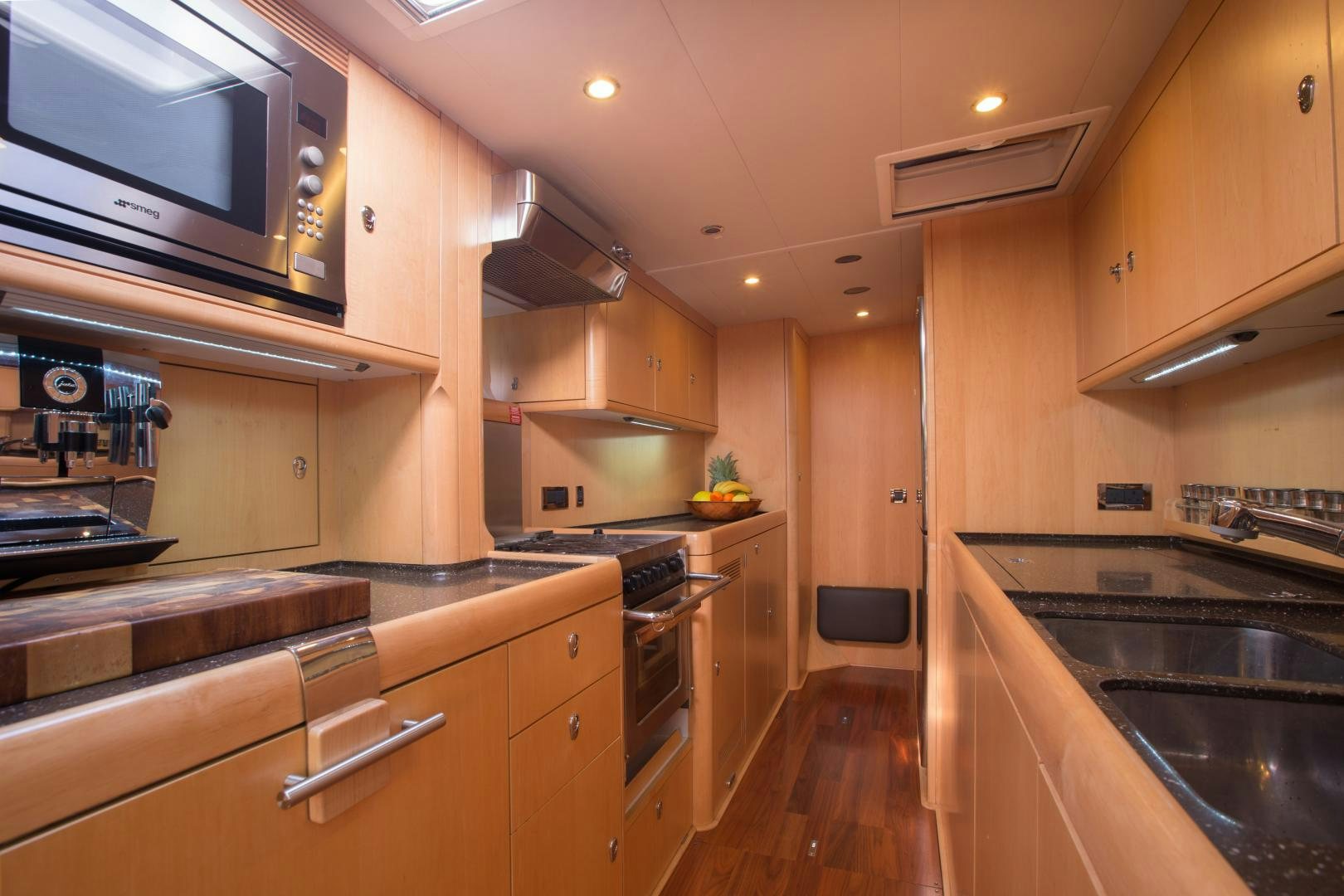 a kitchen with a microwave oven and a microwave oven aboard MATHILDA SOUND Yacht for Sale